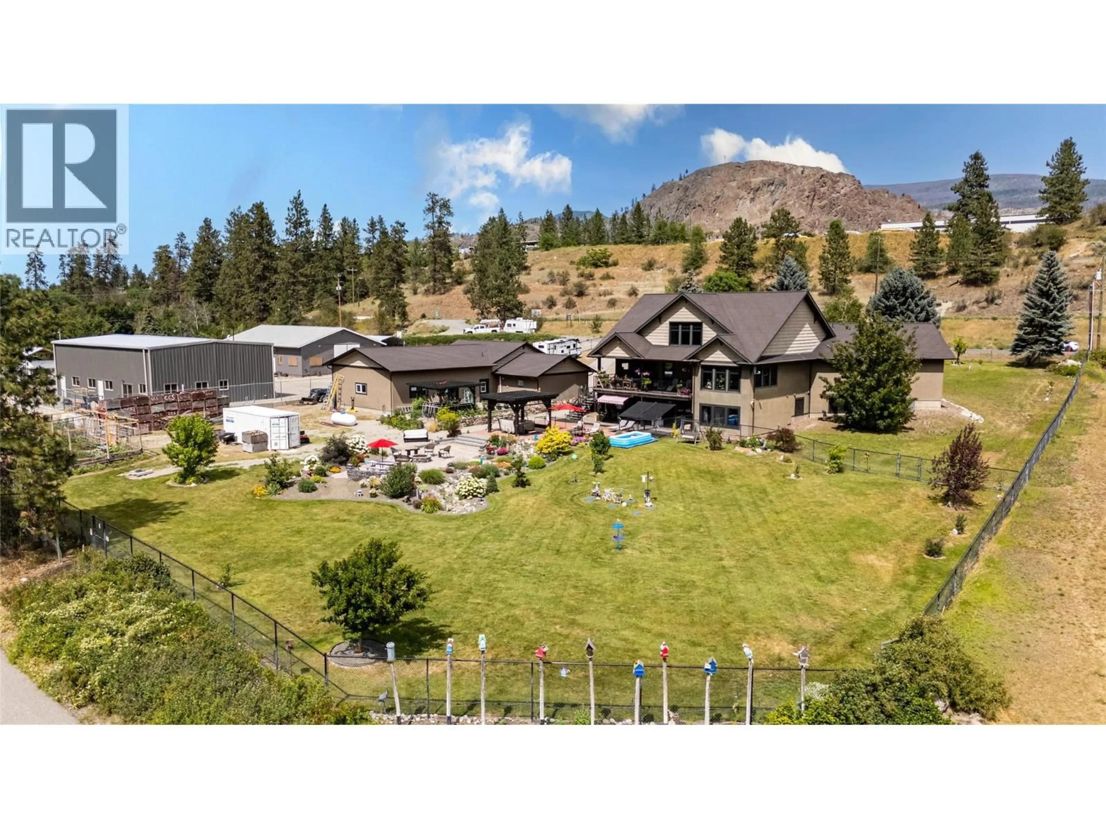 A pic from outside/outdoor area/front of a property/back of a property/a pic from drone, mountain view for 1788 ALBA ROAD, Okanagan Falls British Columbia V0H1R2