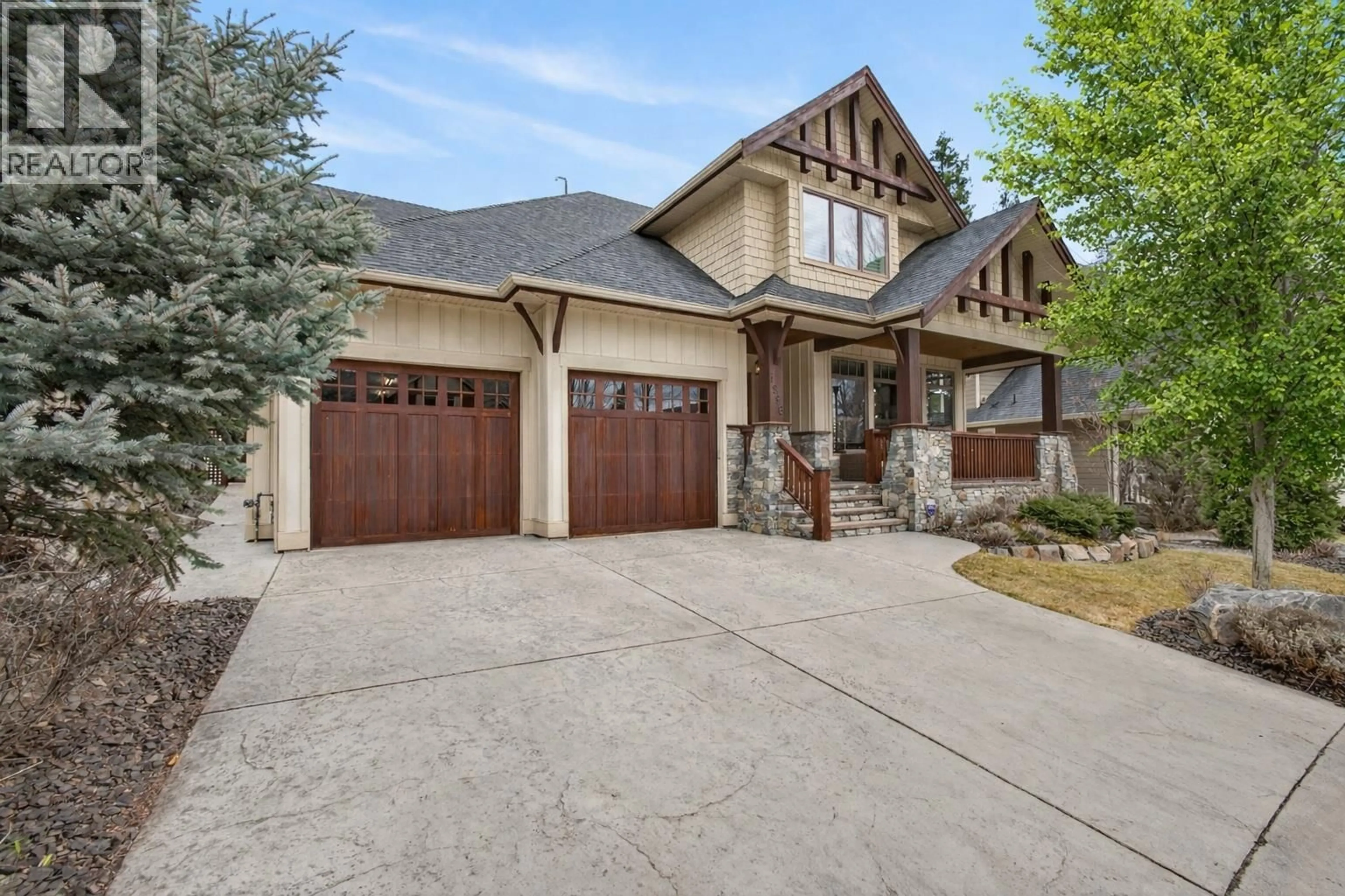 Home with brick exterior material, street for 1996 TWIN RIDGE COURT, Kelowna British Columbia V1V2X8