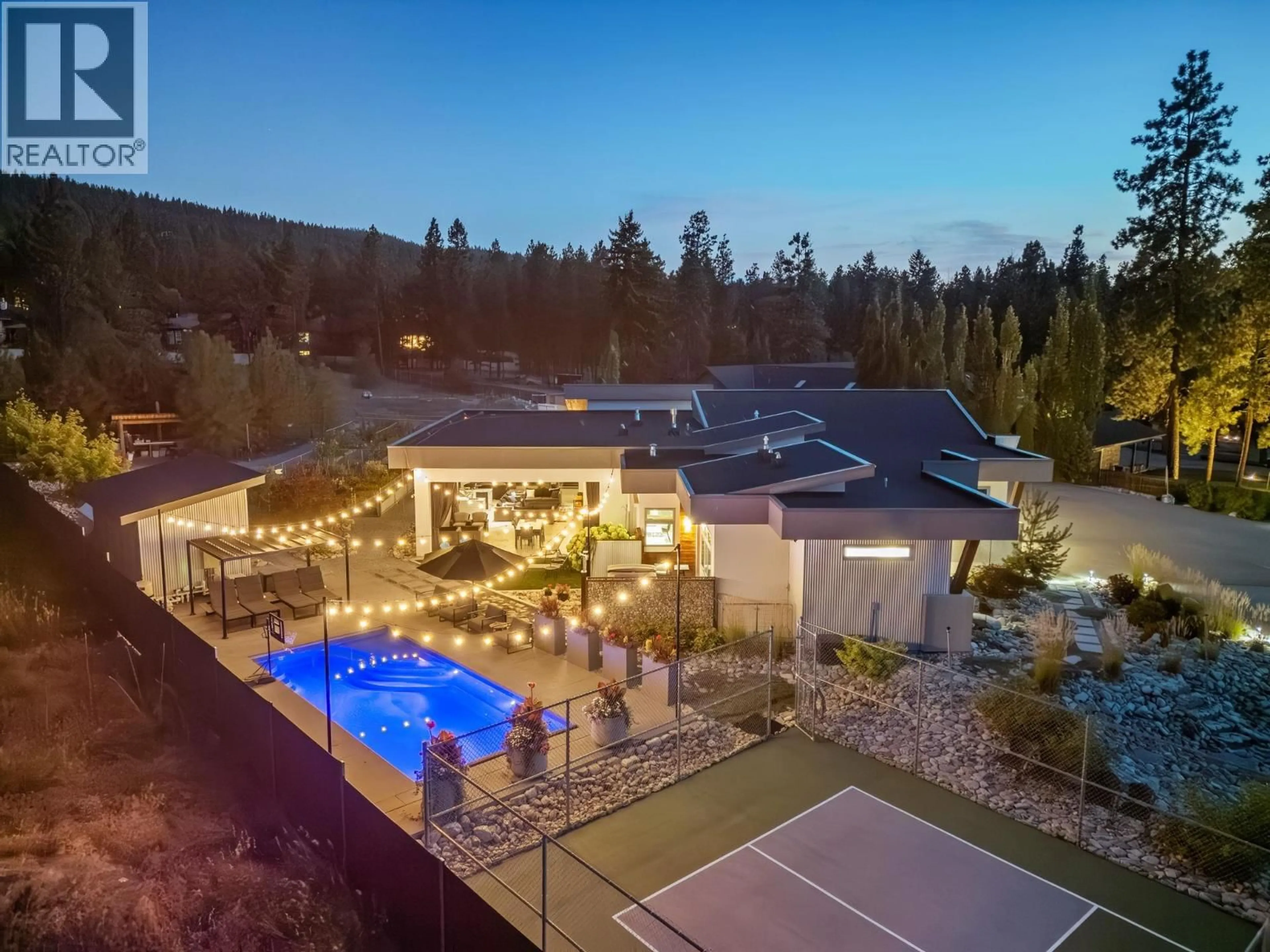 A pic from outside/outdoor area/front of a property/back of a property/a pic from drone, mountain view for 4535 MCCULLOCH ROAD, Kelowna British Columbia V1W4G1