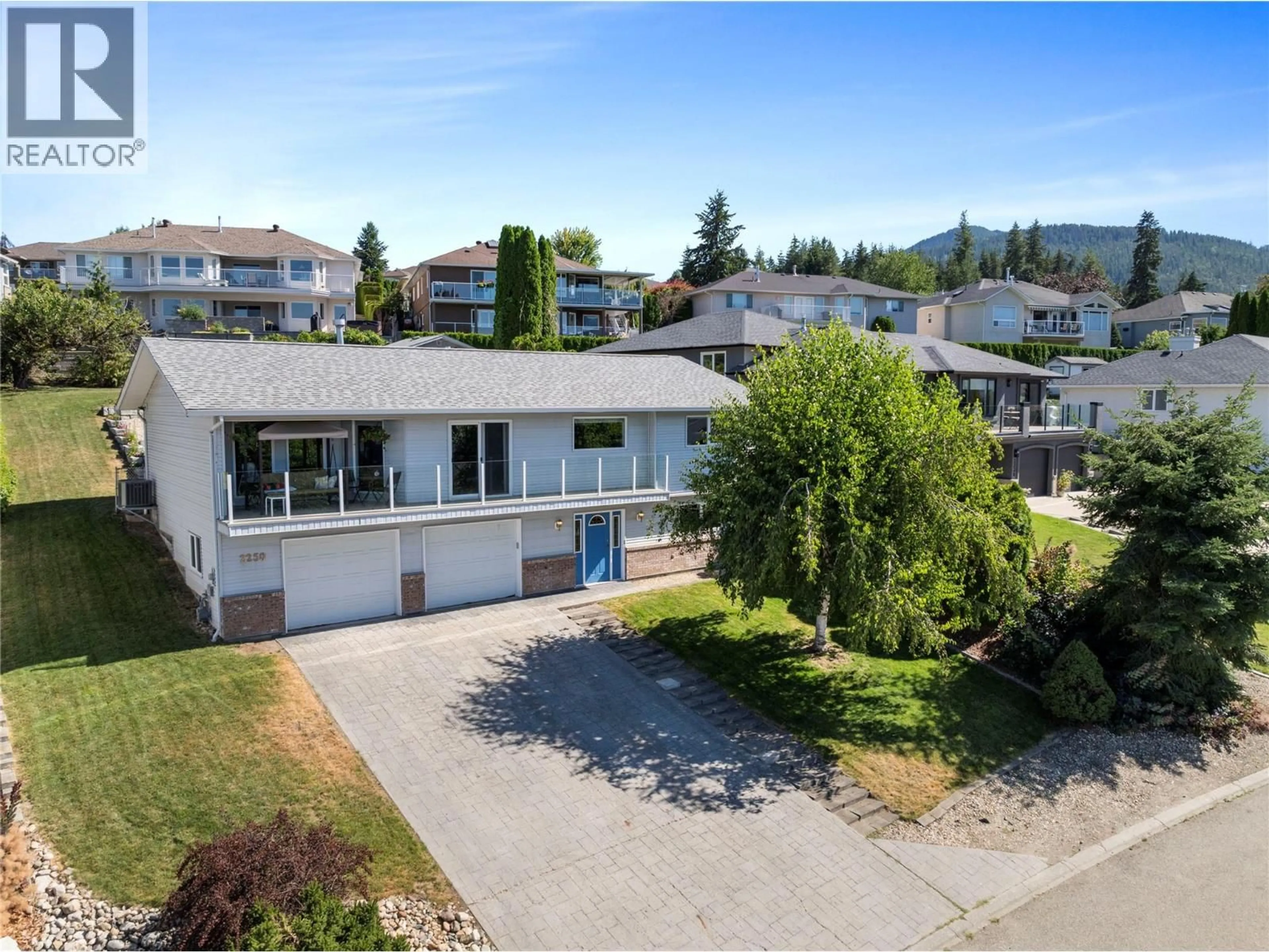 A pic from outside/outdoor area/front of a property/back of a property/a pic from drone, mountain view for 2250 3 AVENUE SOUTHEAST, Salmon Arm British Columbia V1E1K1