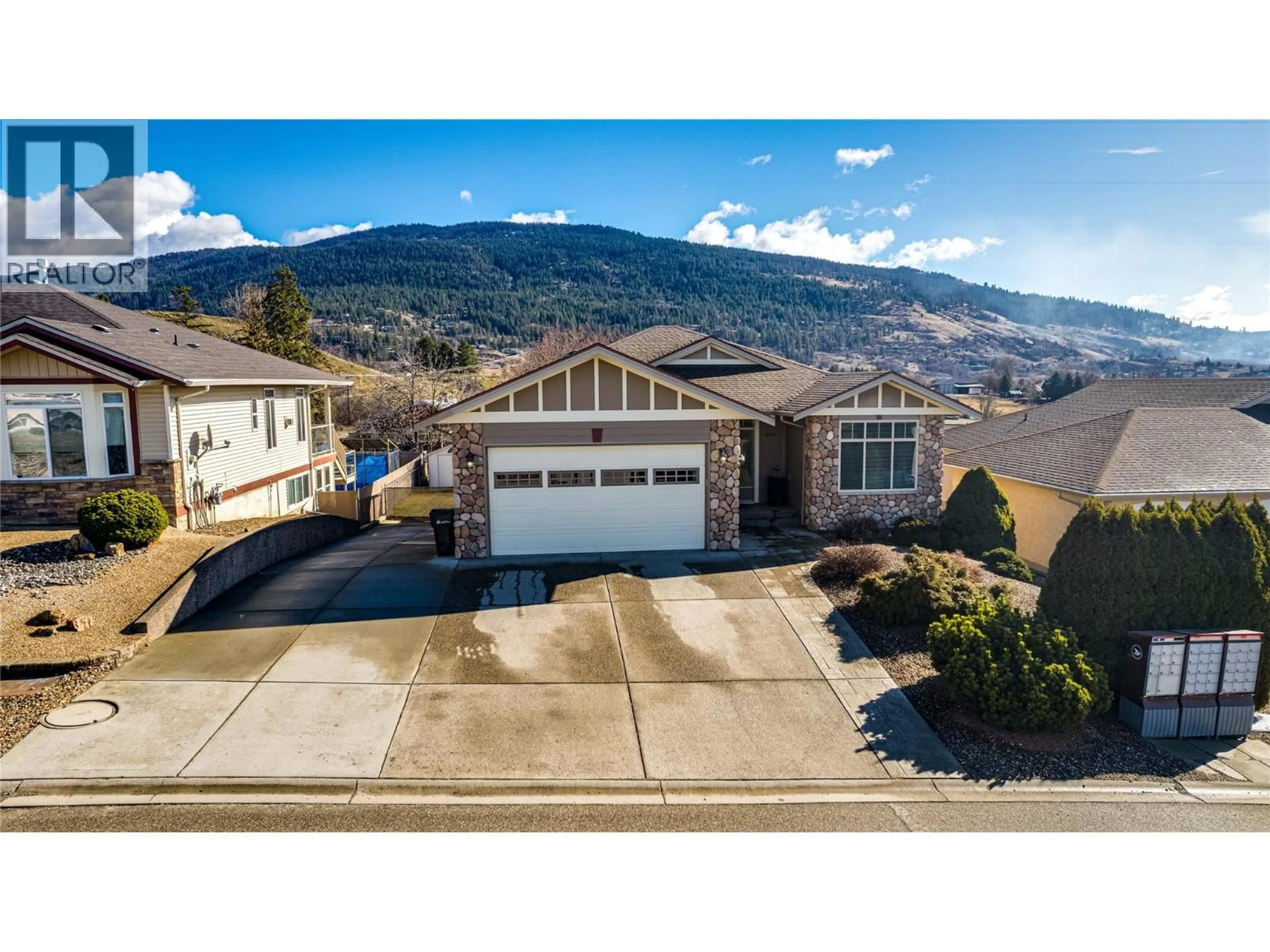 A pic from outside/outdoor area/front of a property/back of a property/a pic from drone, mountain view for 3409 9 STREET, Vernon British Columbia V1T9V7