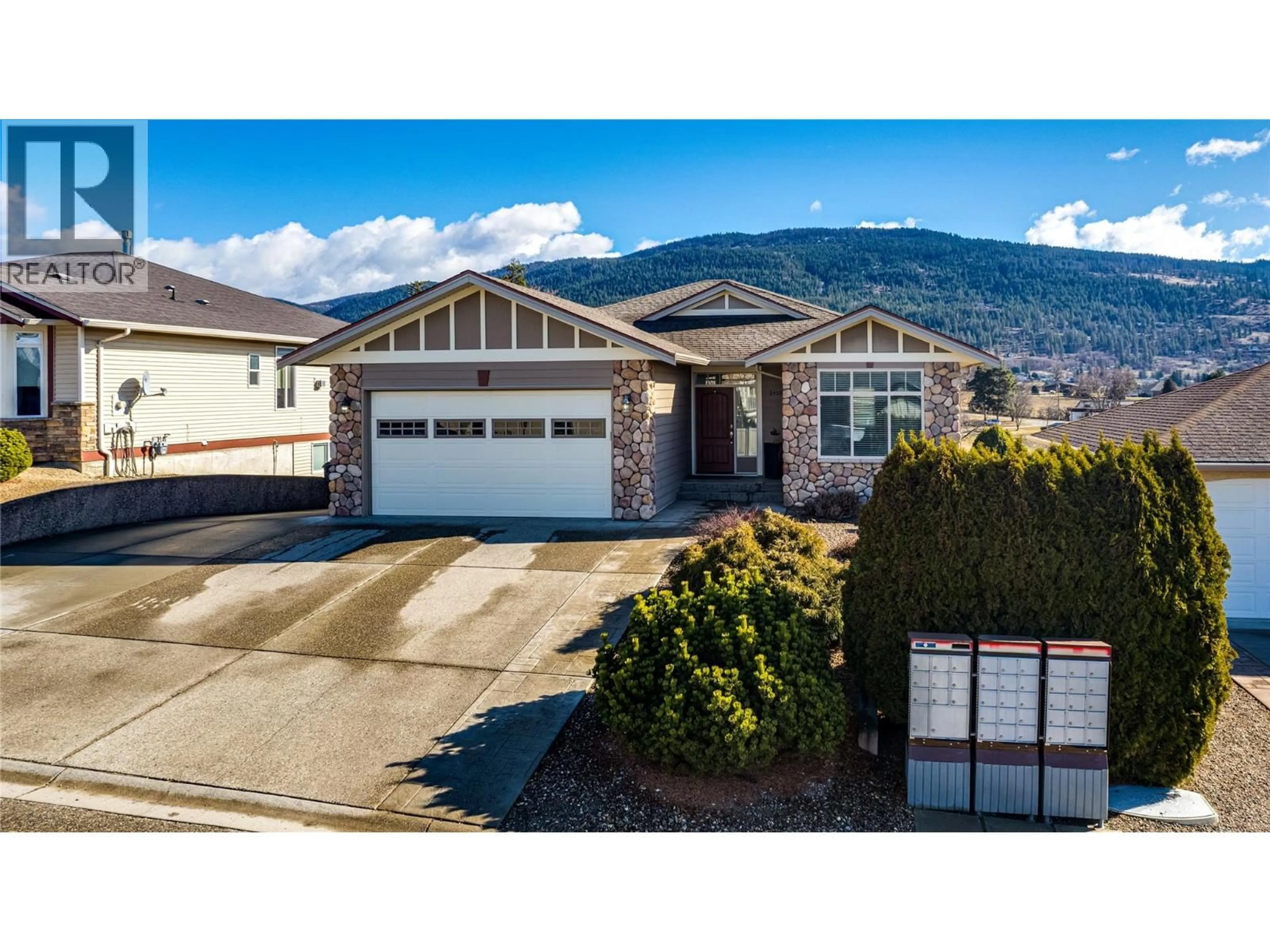 A pic from outside/outdoor area/front of a property/back of a property/a pic from drone, mountain view for 3409 9 STREET, Vernon British Columbia V1T9V7