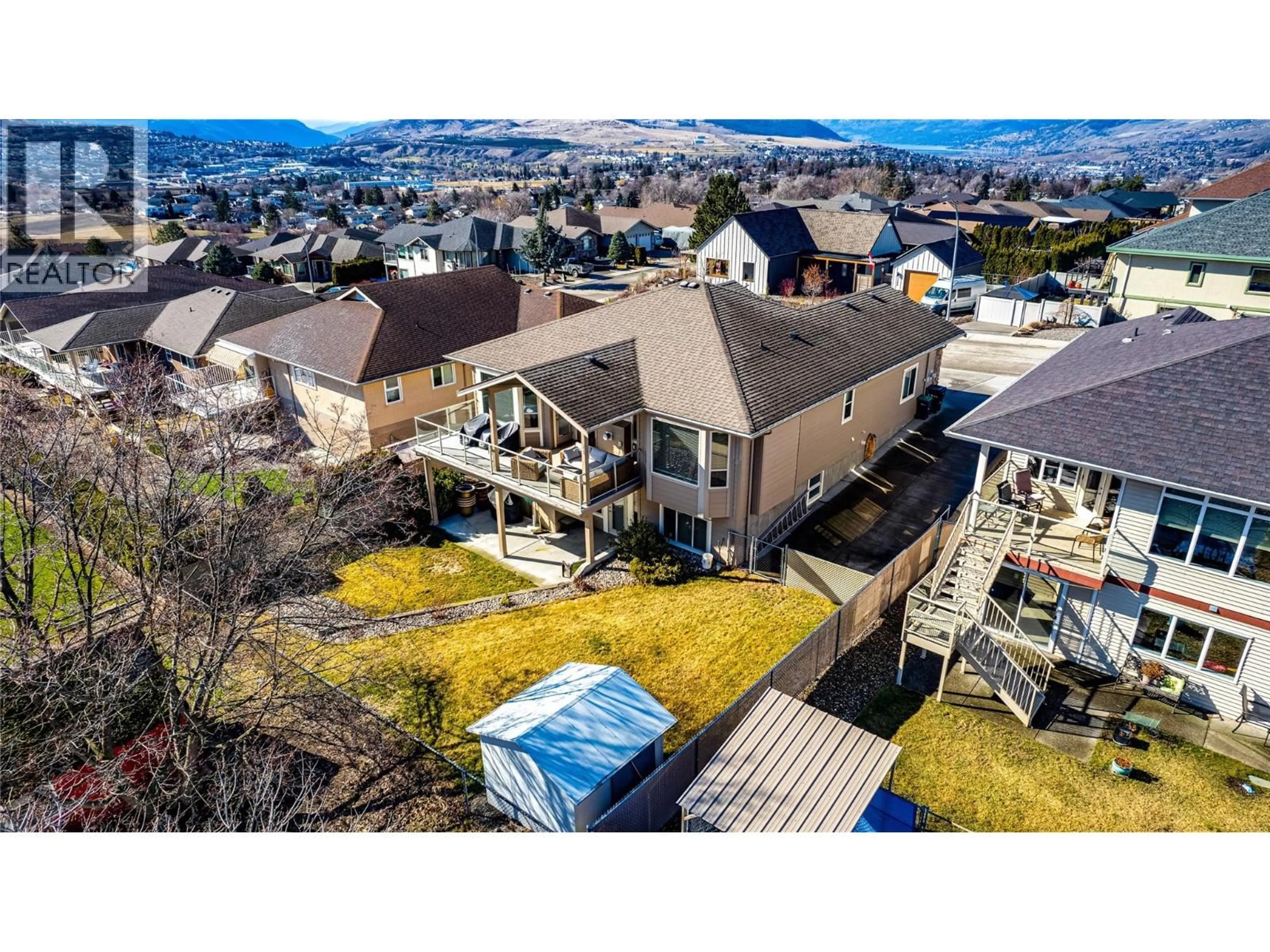 A pic from outside/outdoor area/front of a property/back of a property/a pic from drone, mountain view for 3409 9 STREET, Vernon British Columbia V1T9V7