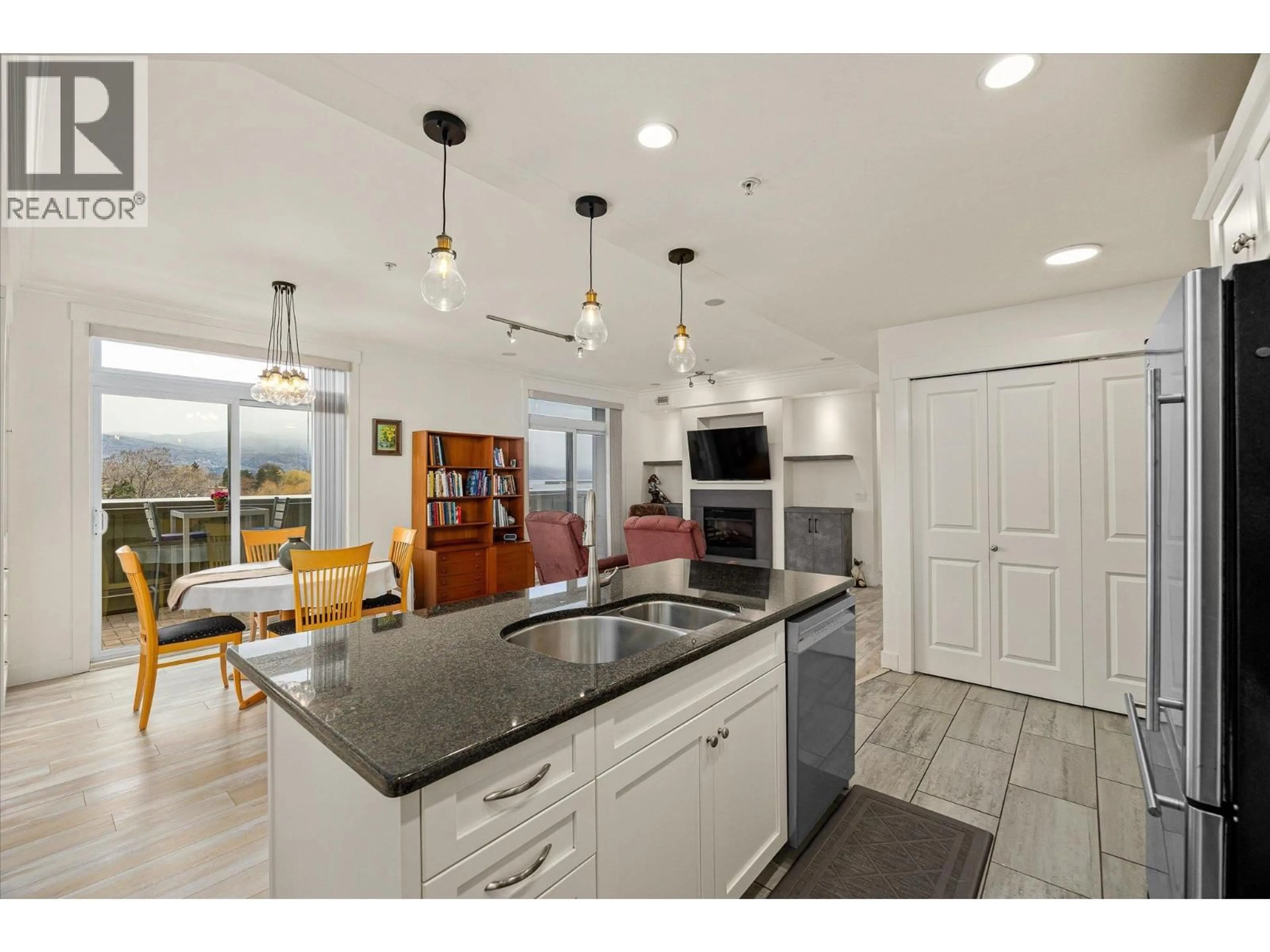 Open concept kitchen, ceramic/tile floor for 304 - 2901 ABBOTT STREET, Kelowna British Columbia V1Y1G7