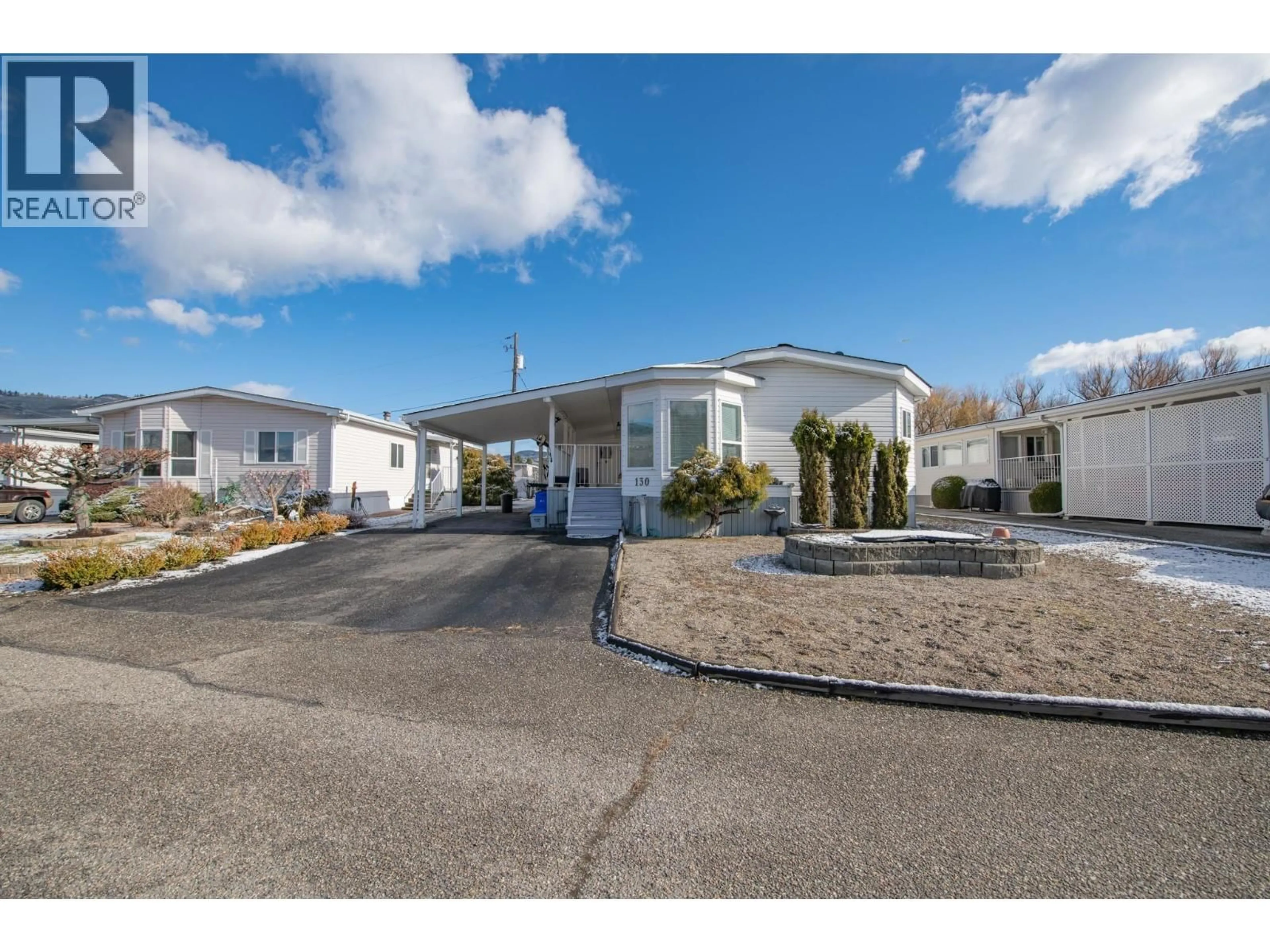 A pic from outside/outdoor area/front of a property/back of a property/a pic from drone, street for 130 - 5484 25 AVENUE, Vernon British Columbia V1T7A8