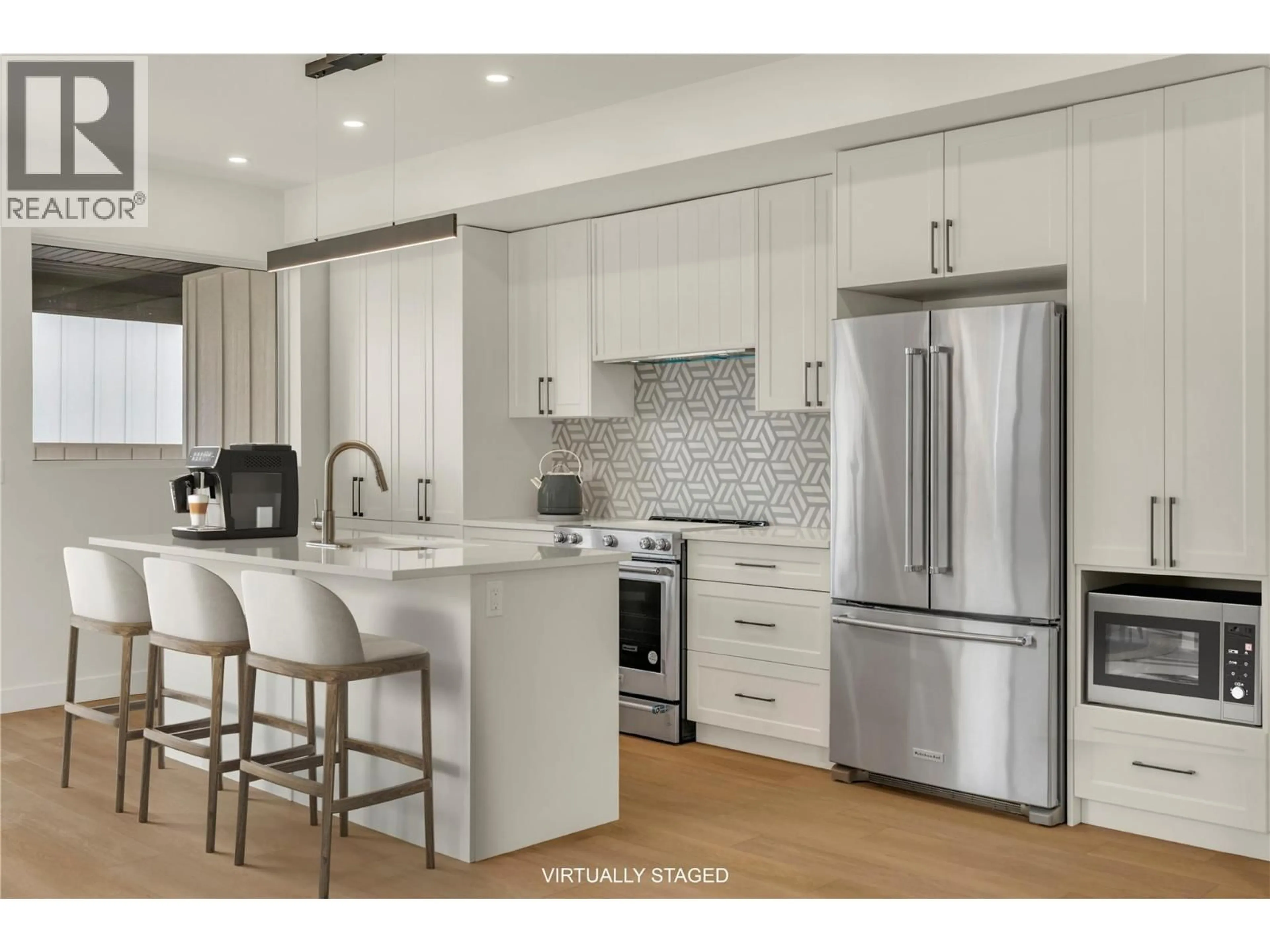 Open concept kitchen, ceramic/tile floor for 101 - 10907 PRAIRIE VALLEY ROAD, Summerland British Columbia V0H1Z8