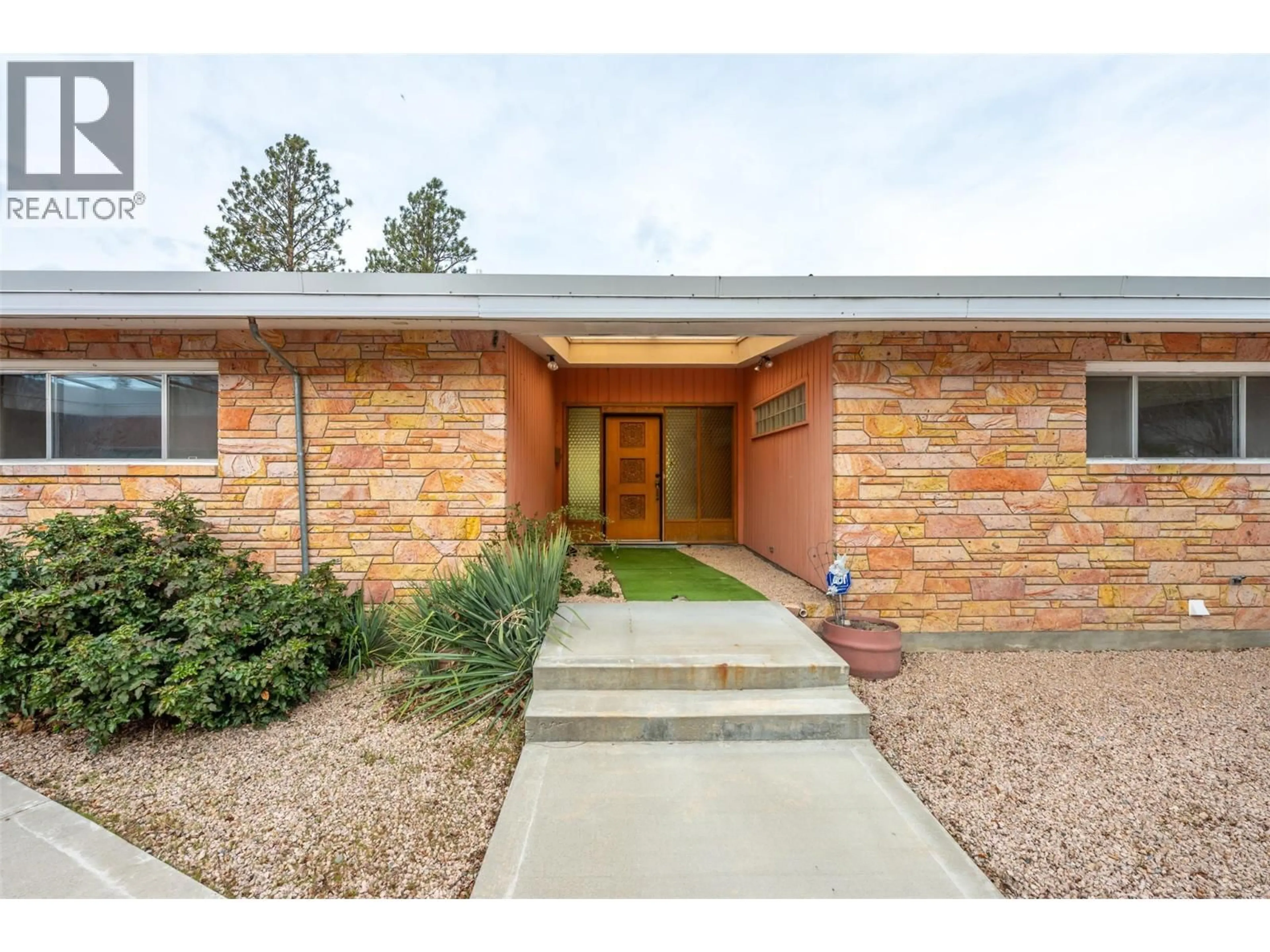 Home with brick exterior material, street for 102 DERENZY PLACE, Penticton British Columbia V2A8W7