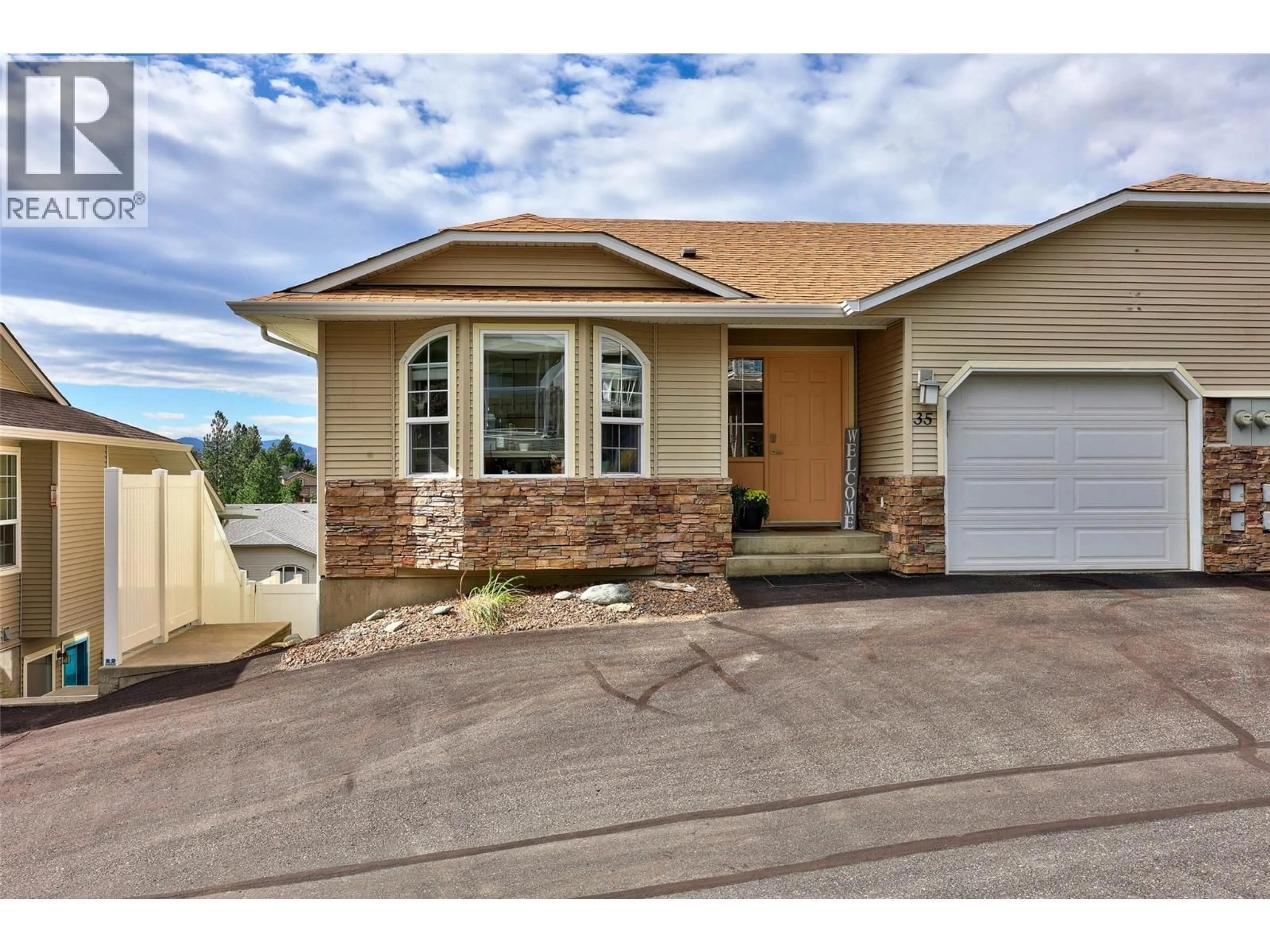 Home with vinyl exterior material, street for 35 - 2210 QU'APPELLE BOULEVARD, Kamloops British Columbia V2E2S6