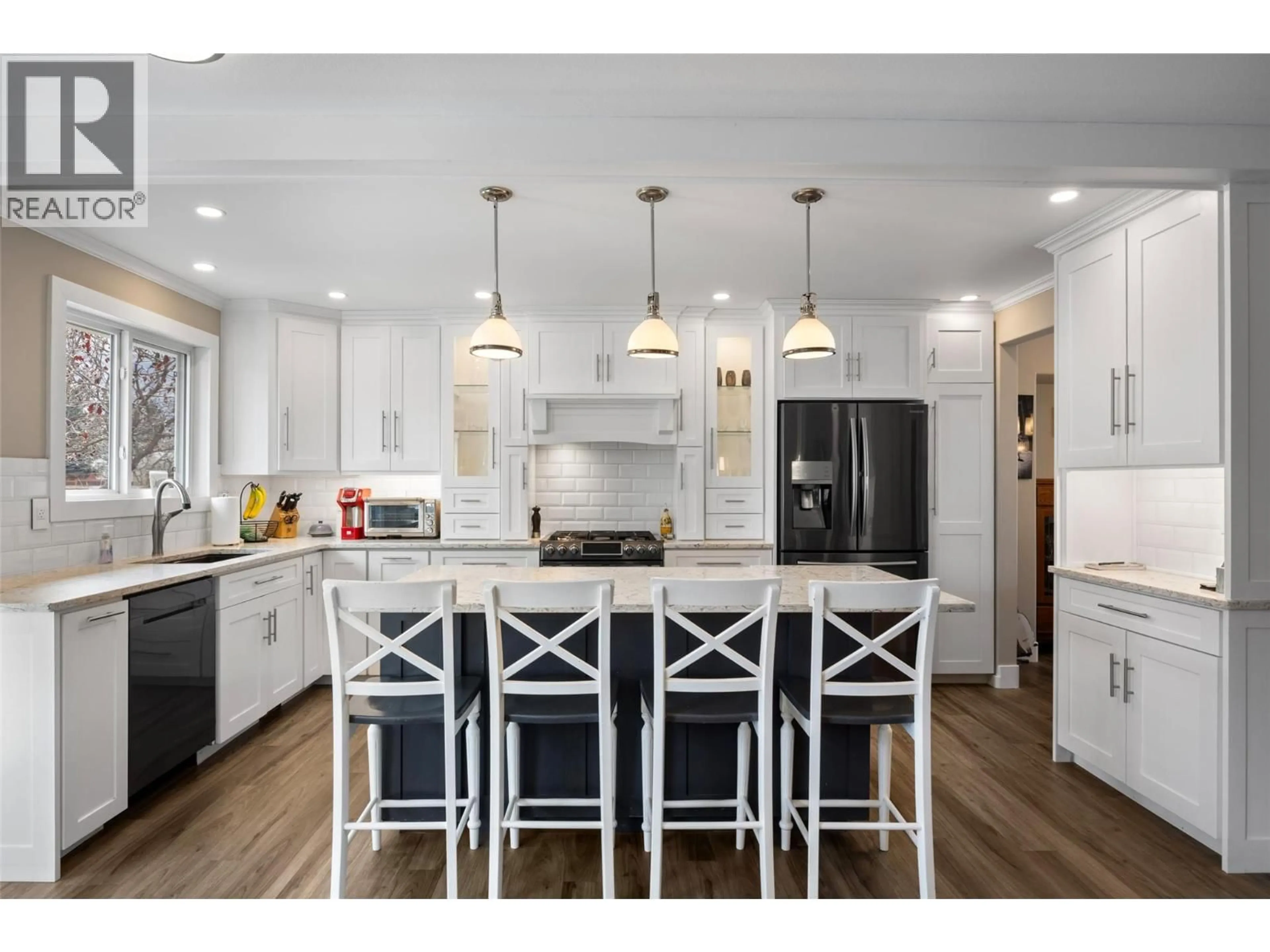 Open concept kitchen, wood/laminate floor for 229 CHETWYND DRIVE, Kamloops British Columbia V2H1L7