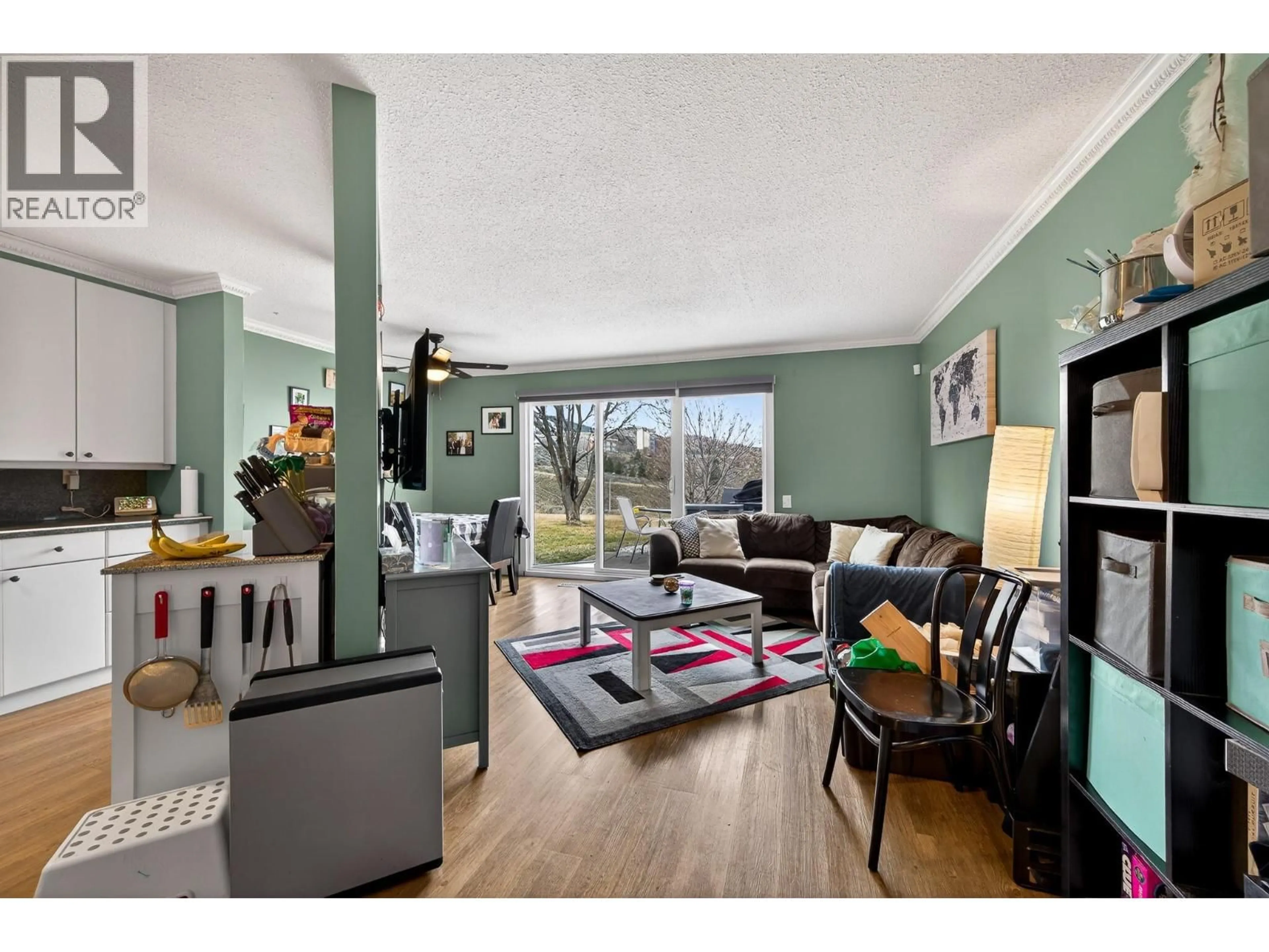 Living room with furniture, wood/laminate floor for 76 - 580 DALGLEISH DRIVE, Kamloops British Columbia V2C5W7