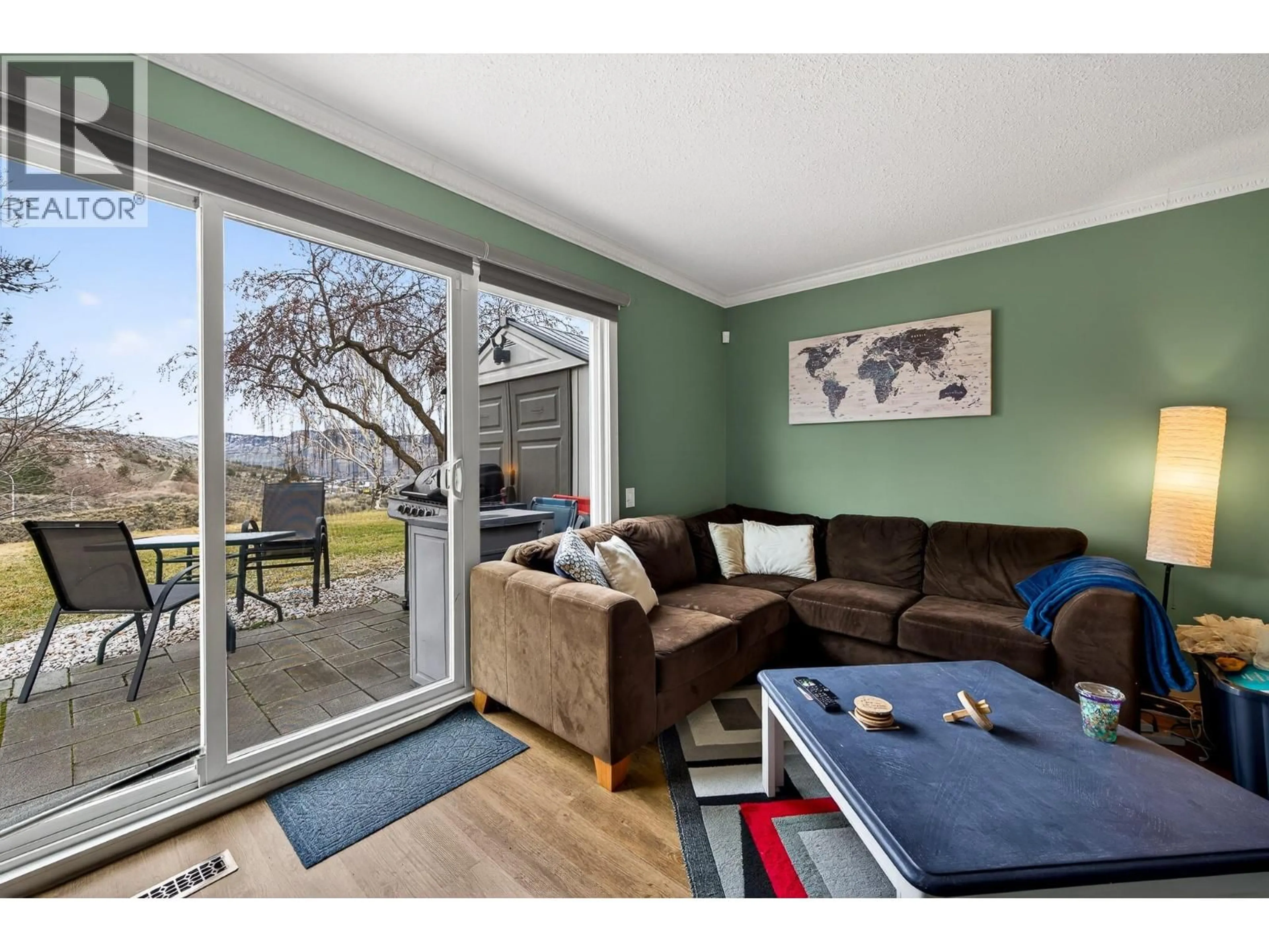 Living room with furniture, wood/laminate floor for 76 - 580 DALGLEISH DRIVE, Kamloops British Columbia V2C5W7