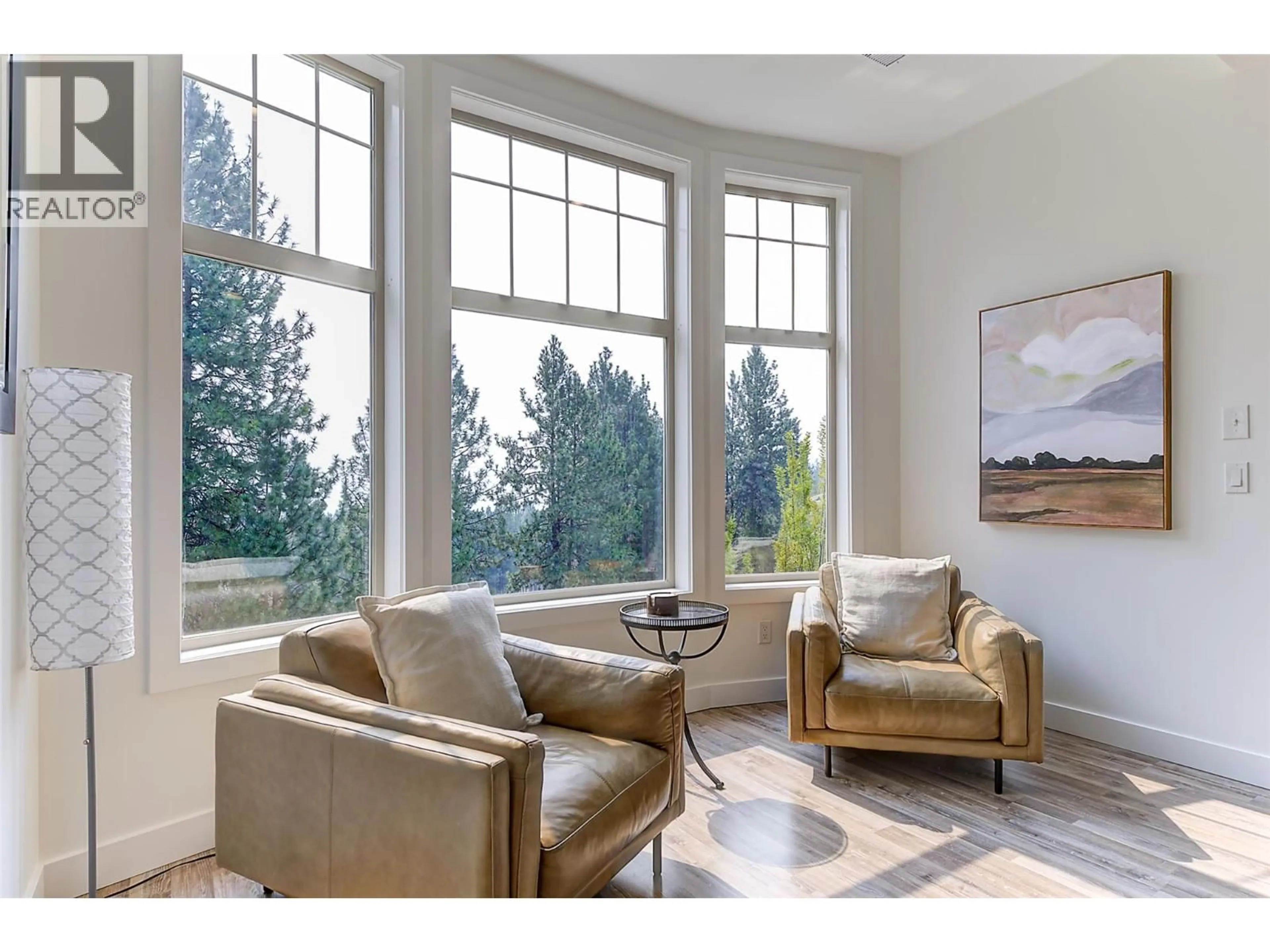 Living room with furniture, ceramic/tile floor for 204 - 1795 COUNTRY CLUB DRIVE, Kelowna British Columbia V1V2V9