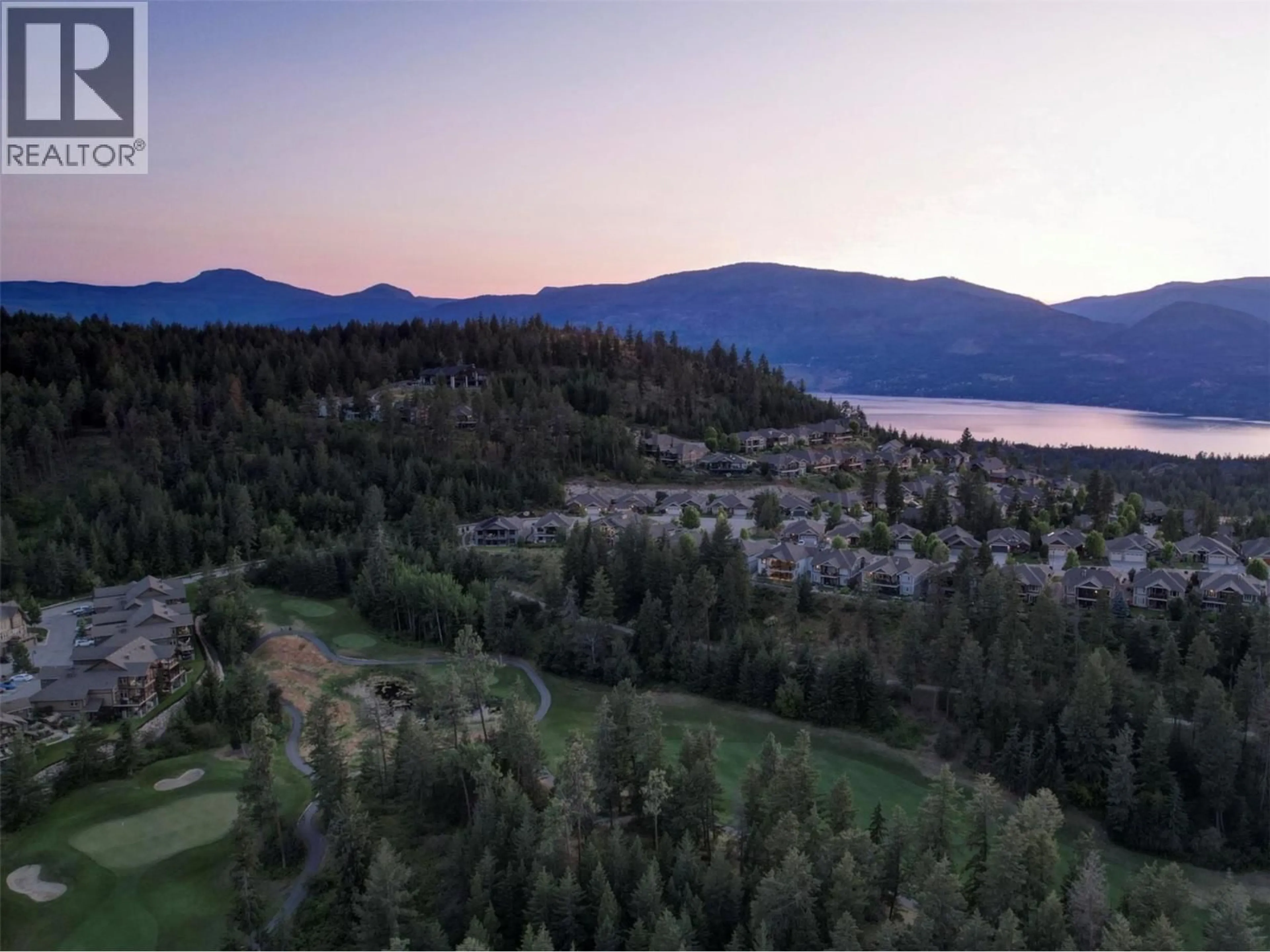 A pic from outside/outdoor area/front of a property/back of a property/a pic from drone, water/lake/river/ocean view for 2 - 333 LONGSPOON DRIVE, Vernon British Columbia V1H2L1