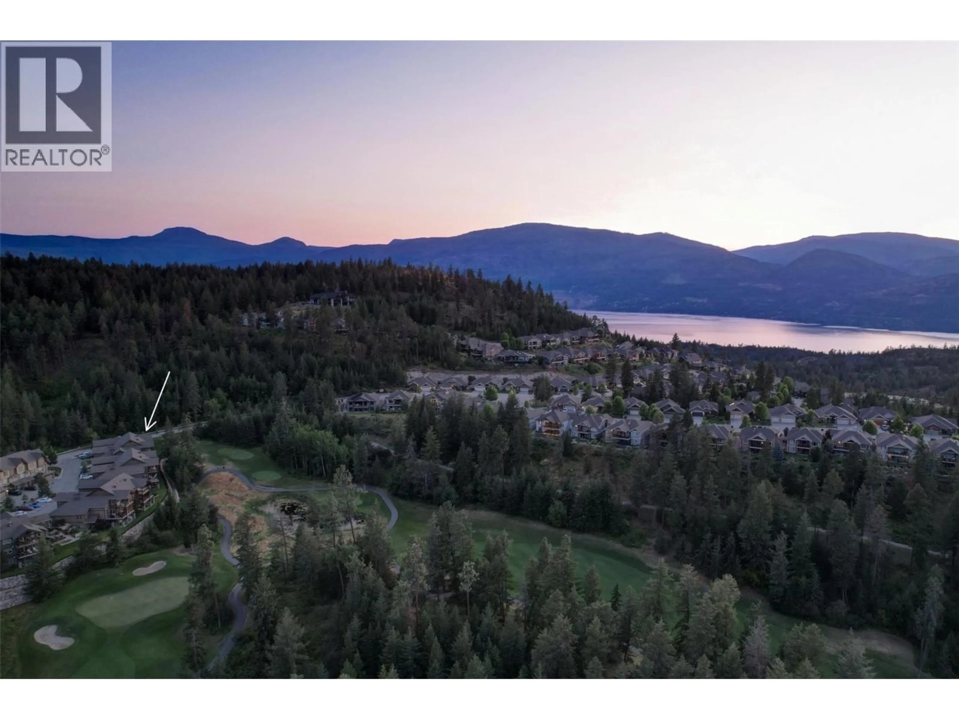 A pic from outside/outdoor area/front of a property/back of a property/a pic from drone, unknown for 2 - 333 LONGSPOON DRIVE, Vernon British Columbia V1H2L1