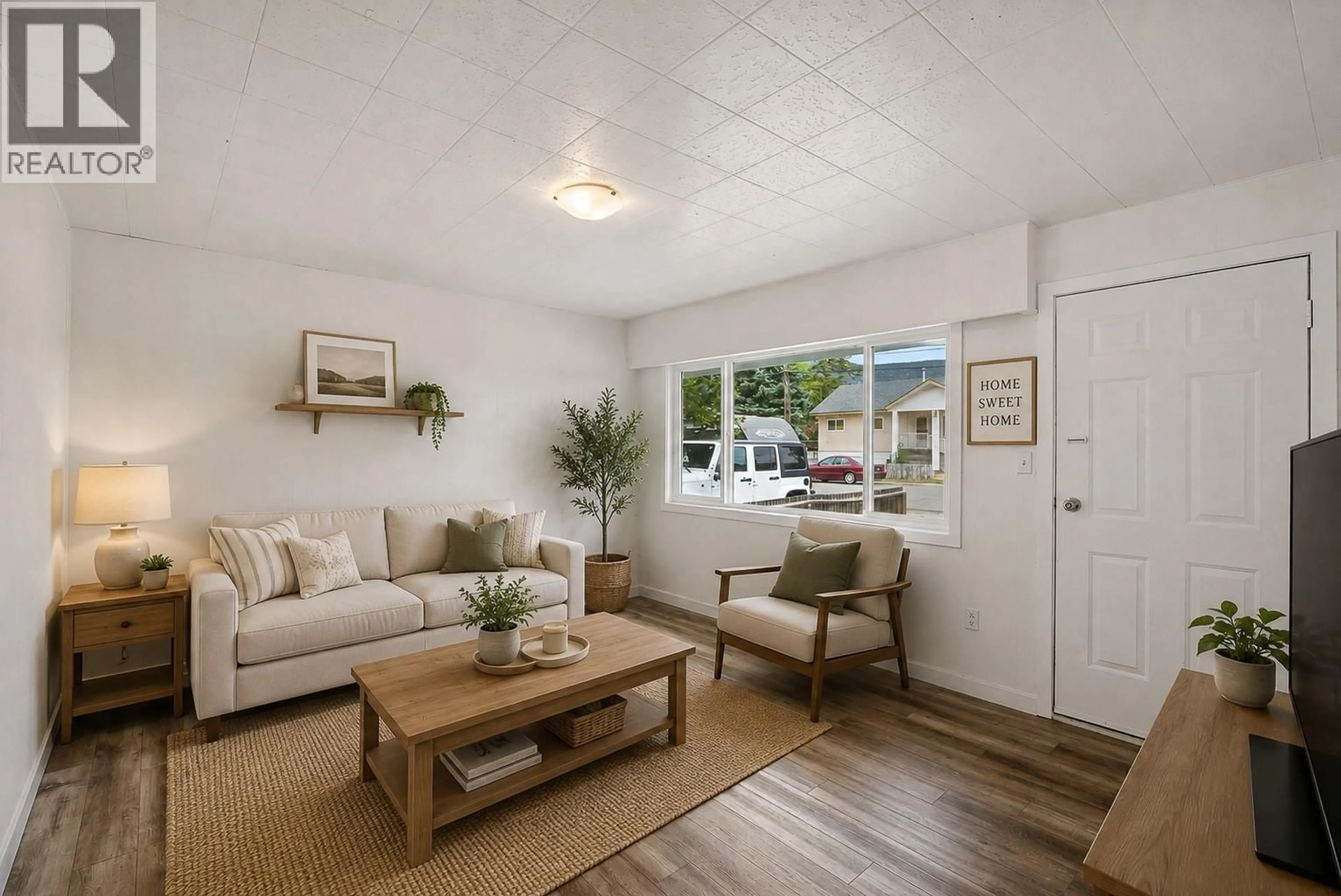 Living room with furniture, unknown for 2564 COUTLEE AVENUE, Merritt British Columbia V1K1B8