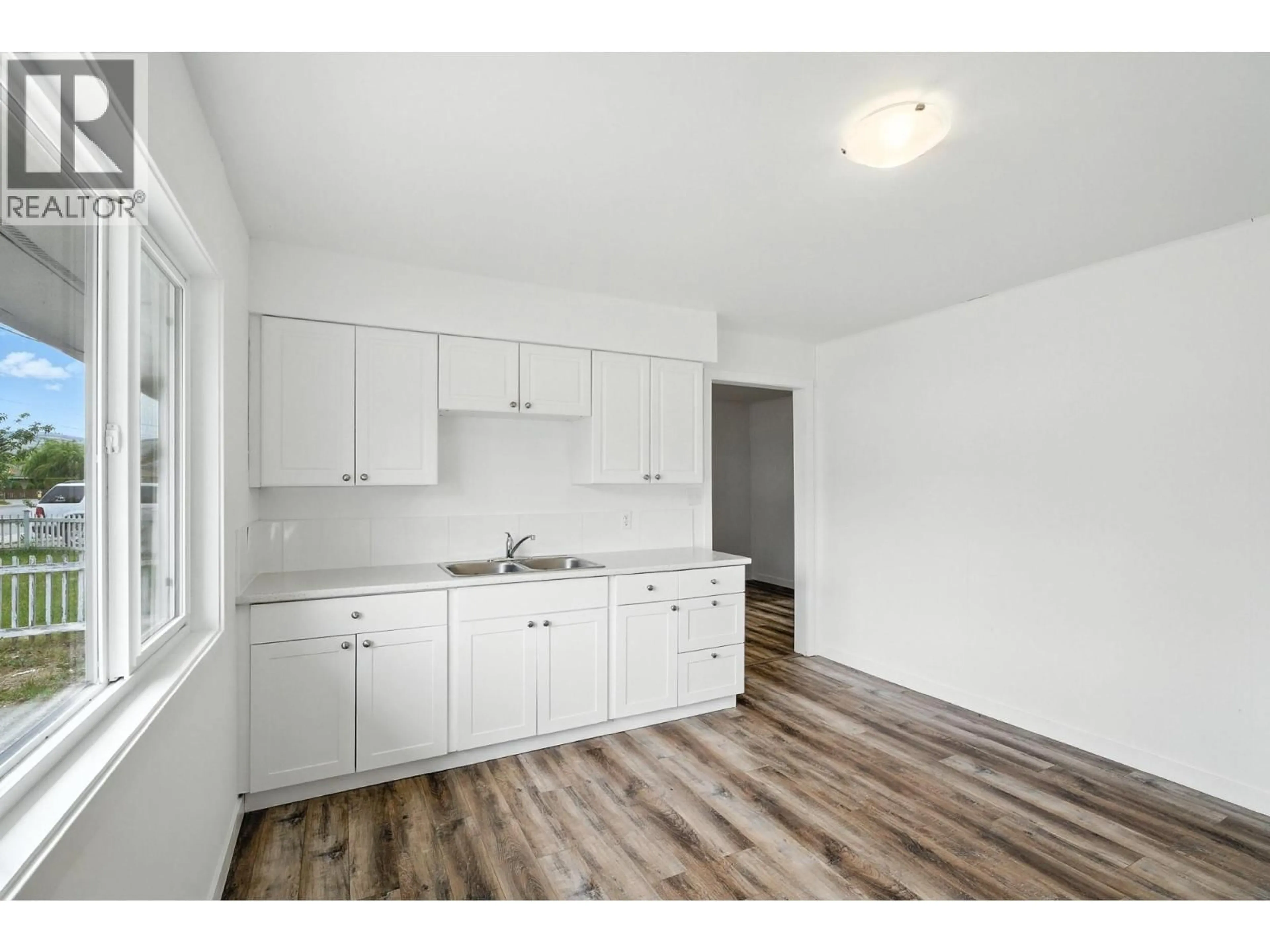 Standard kitchen, wood/laminate floor for 2564 COUTLEE AVENUE, Merritt British Columbia V1K1B8