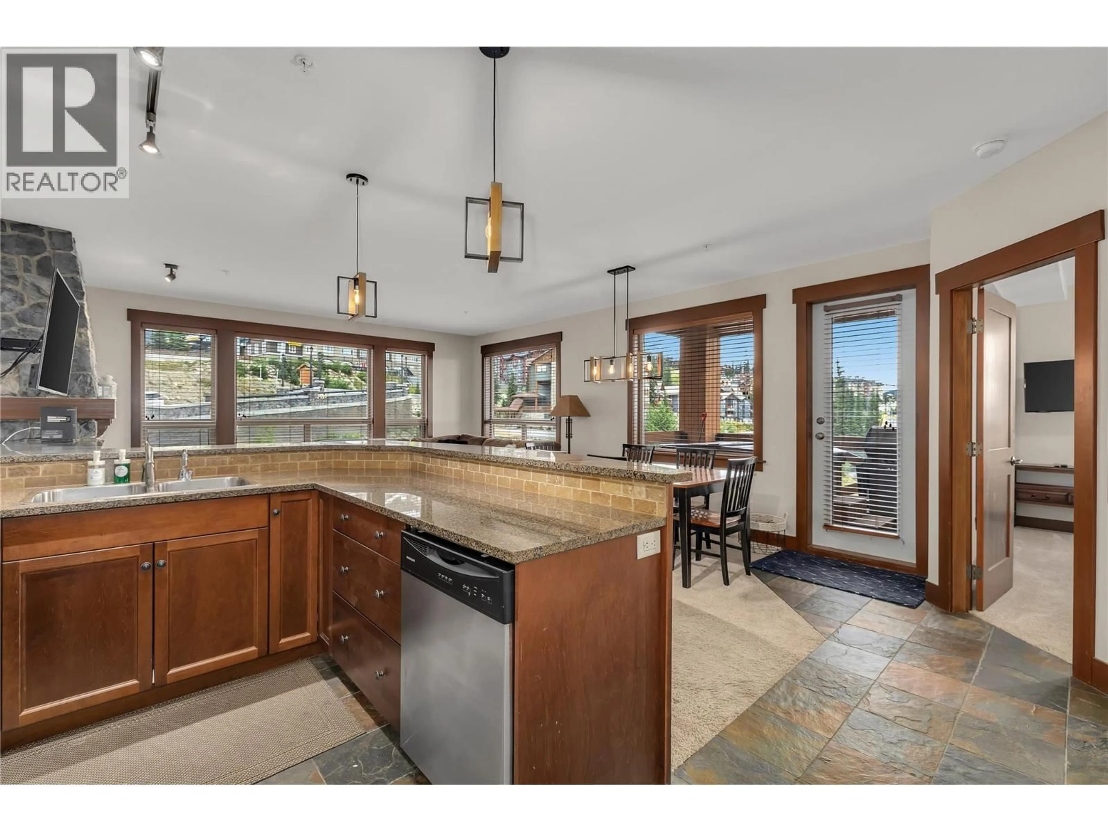 Open concept kitchen, ceramic/tile floor for 301 - 375 RAVEN RIDGE ROAD, Big White British Columbia V1P1P3