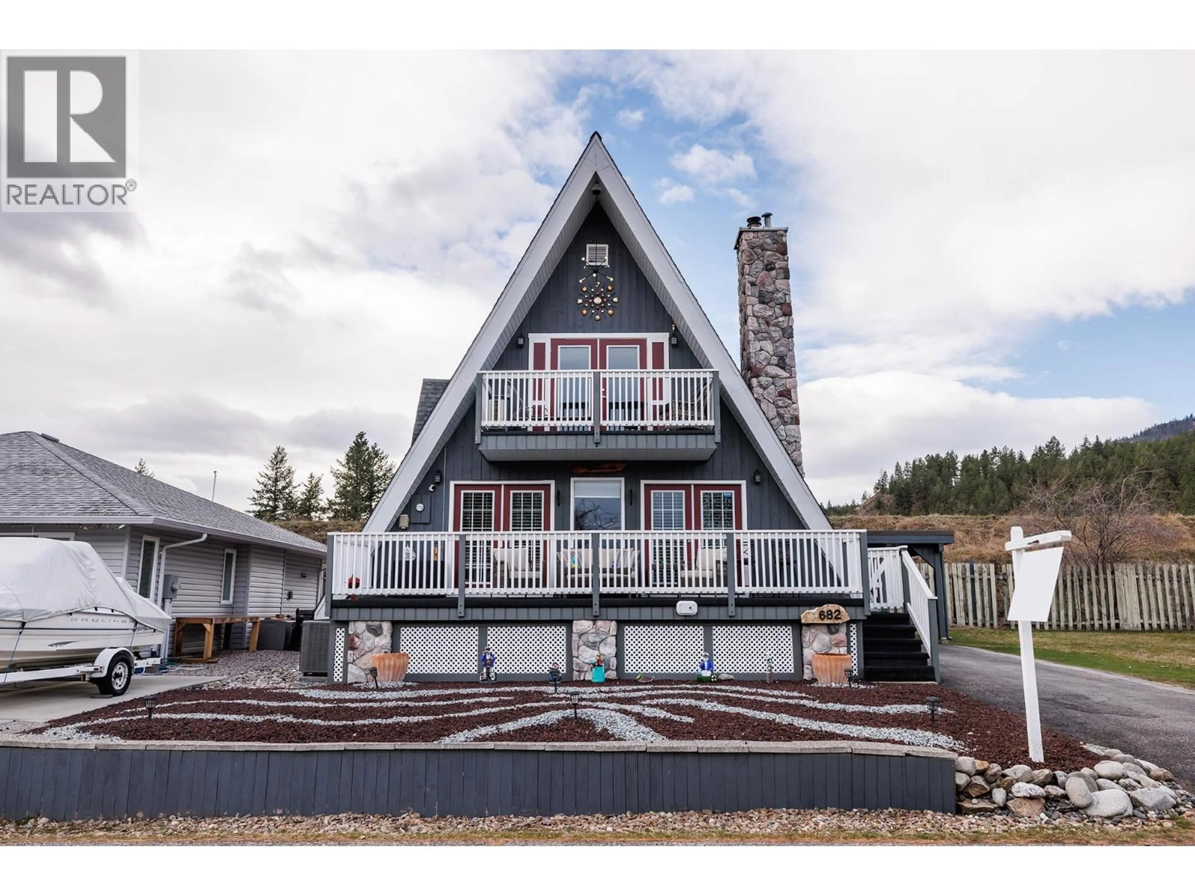 Home with vinyl exterior material, mountain view for 682 COUGAR STREET, Vernon British Columbia V1H2A1