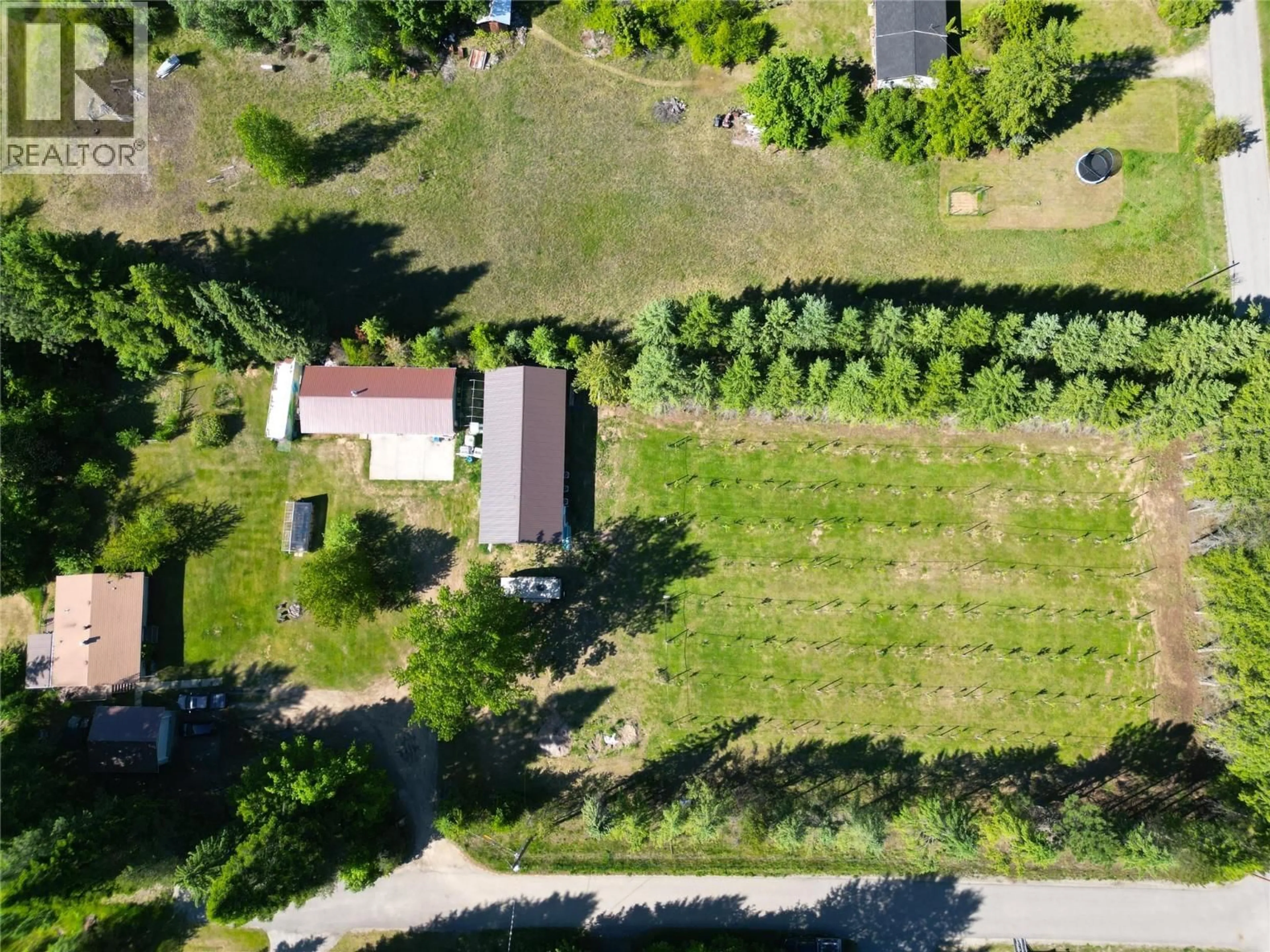 A pic from outside/outdoor area/front of a property/back of a property/a pic from drone, forest/trees view for 1062 SCAMP ROAD, Castlegar British Columbia V1N4R3