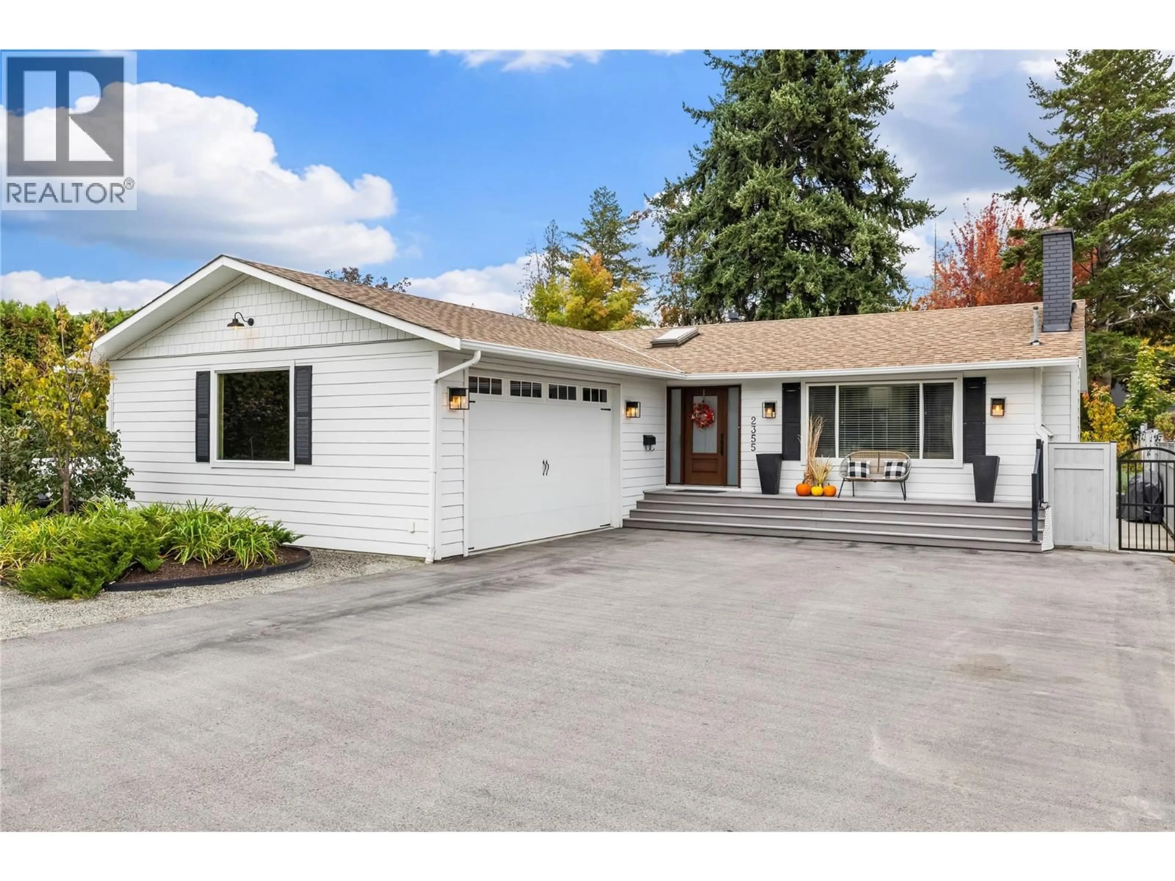 Home with vinyl exterior material, street for 2355 CRESTVIEW ROAD, West Kelowna British Columbia V1Z1Y9