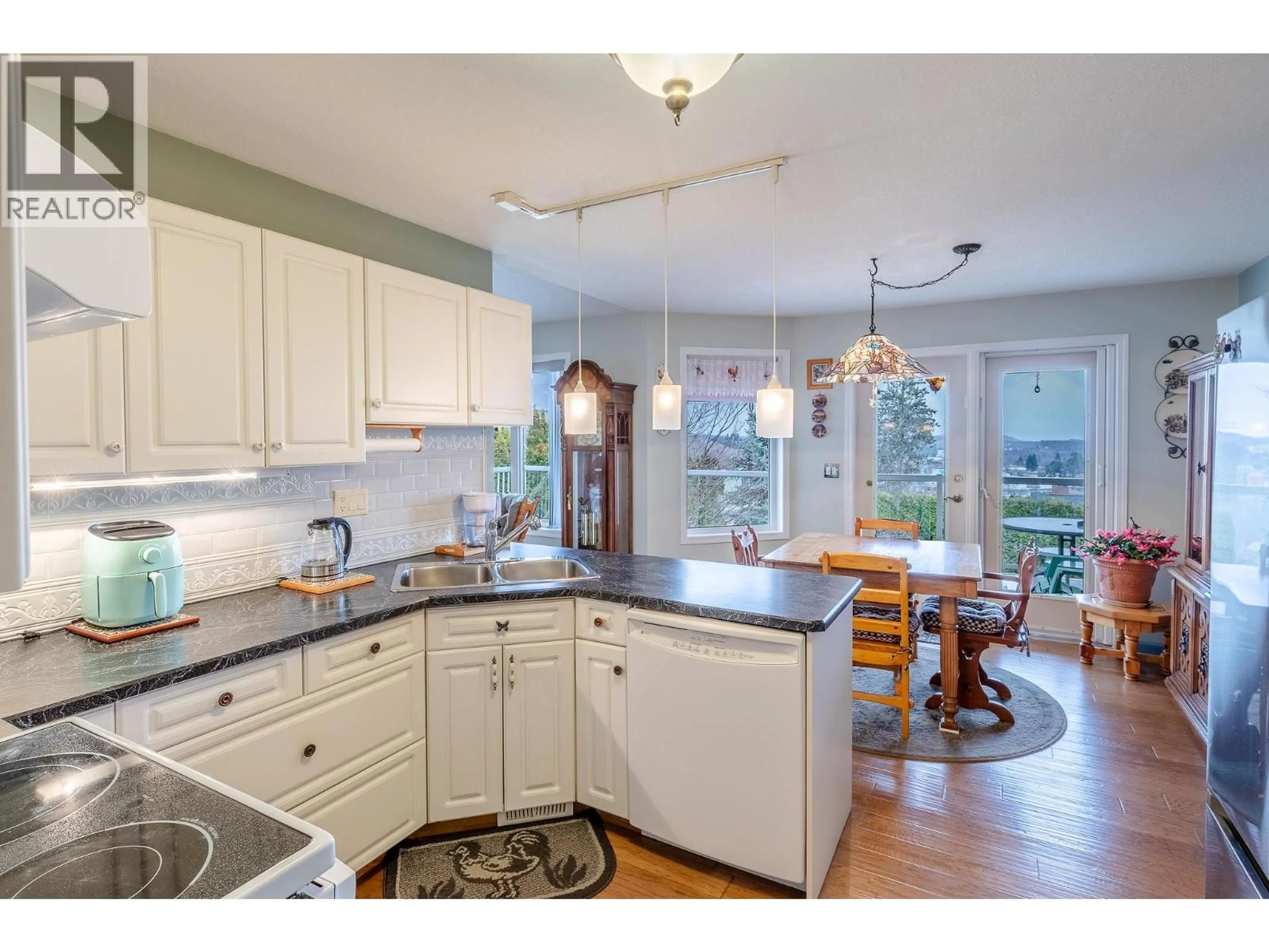 Open concept kitchen, ceramic/tile floor for 1401 HILLSIDE STREET, Creston British Columbia V0B1G0