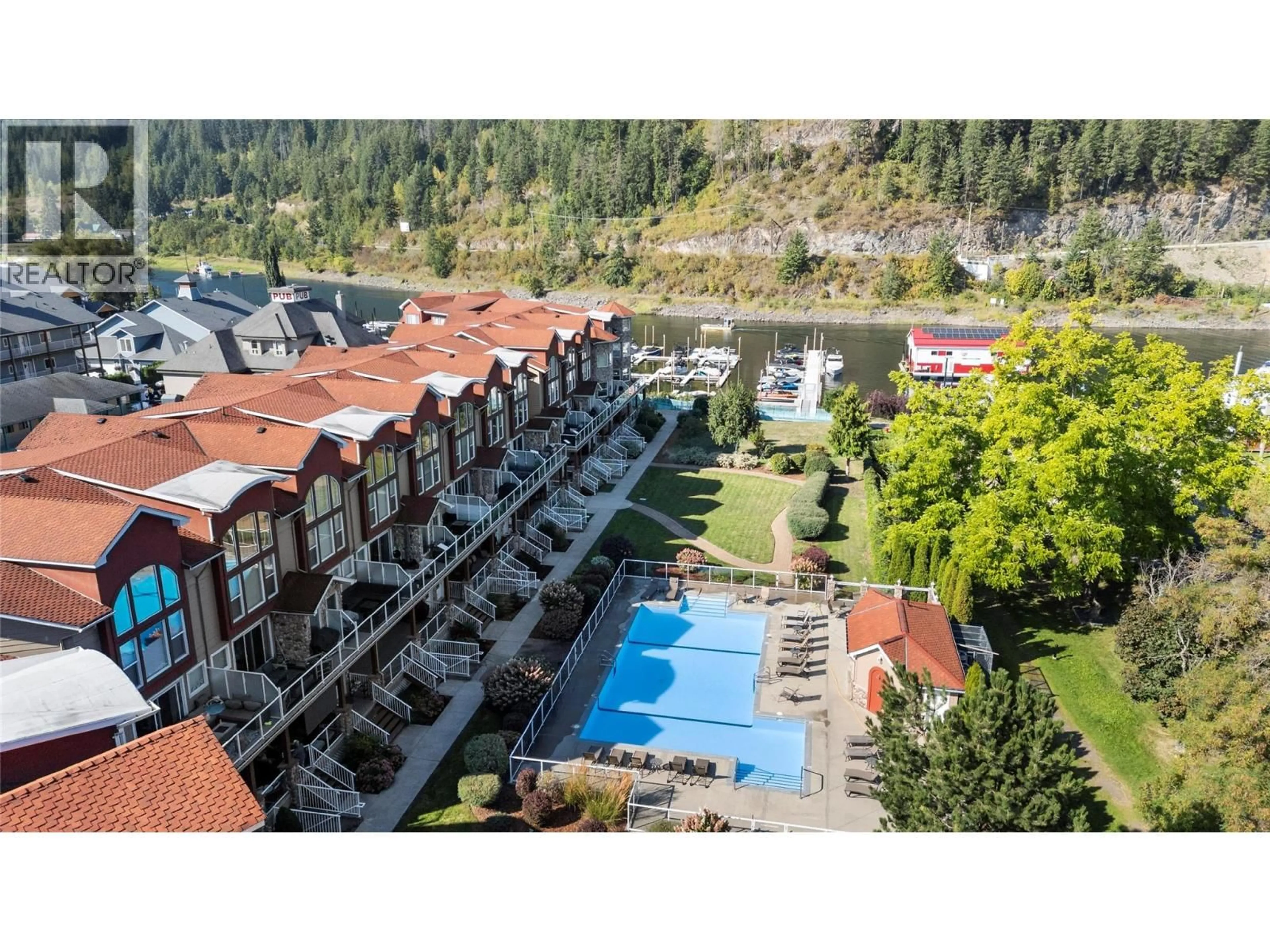 A pic from outside/outdoor area/front of a property/back of a property/a pic from drone, mountain view for 3 - 1130 RIVERSIDE AVENUE, Sicamous British Columbia V0E2V0