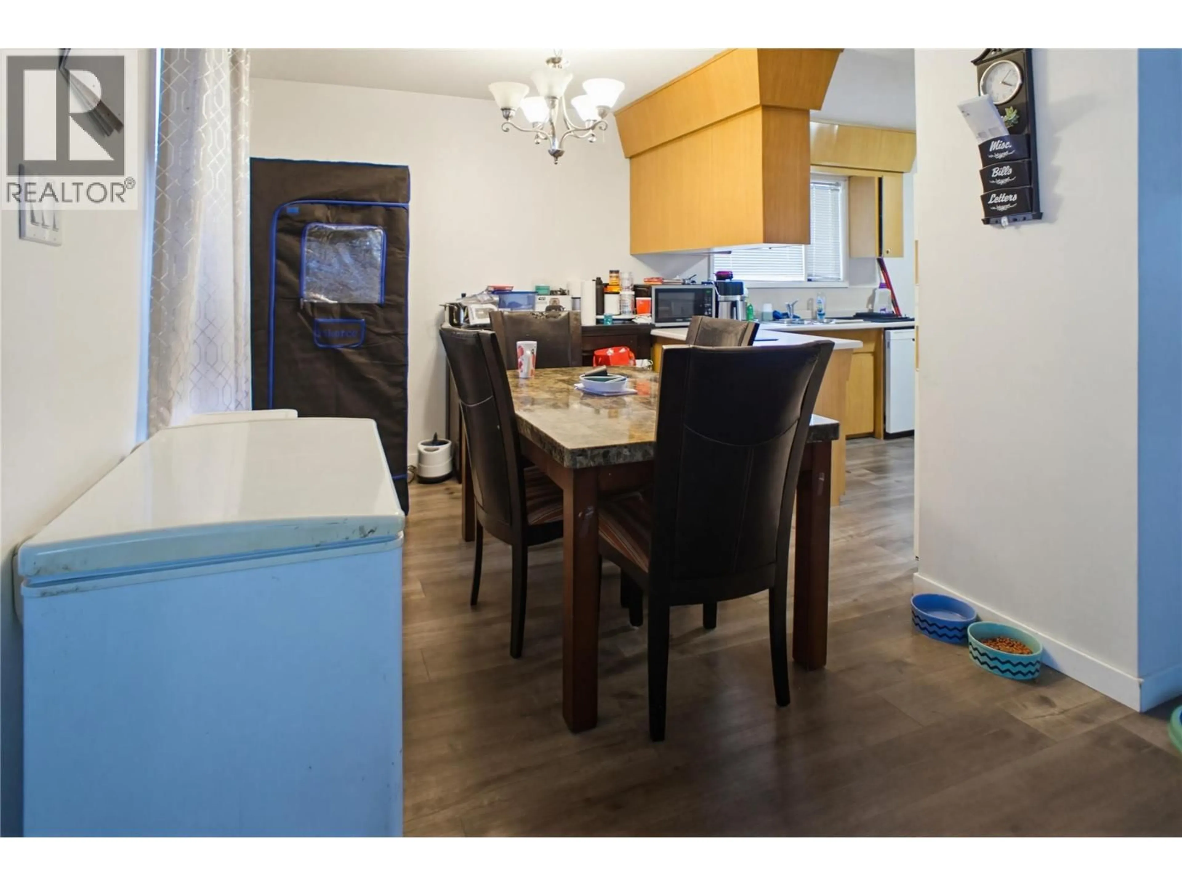 Dining room, wood/laminate floor for 682 ALBERNI AVENUE, Kamloops British Columbia V2B1T1