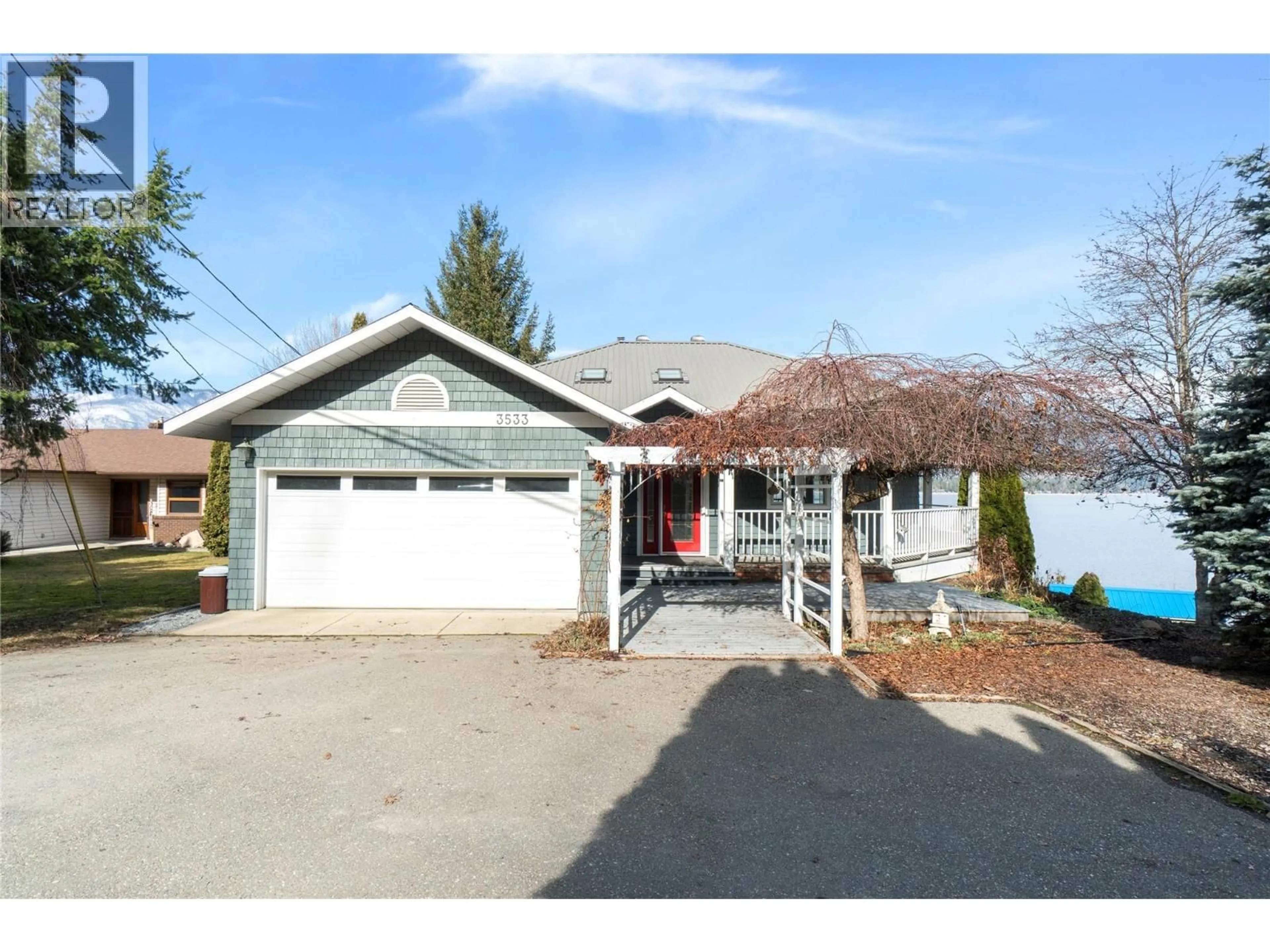 Home with vinyl exterior material, street for 3533 EAGLE BAY ROAD, Blind Bay British Columbia V0E1H1