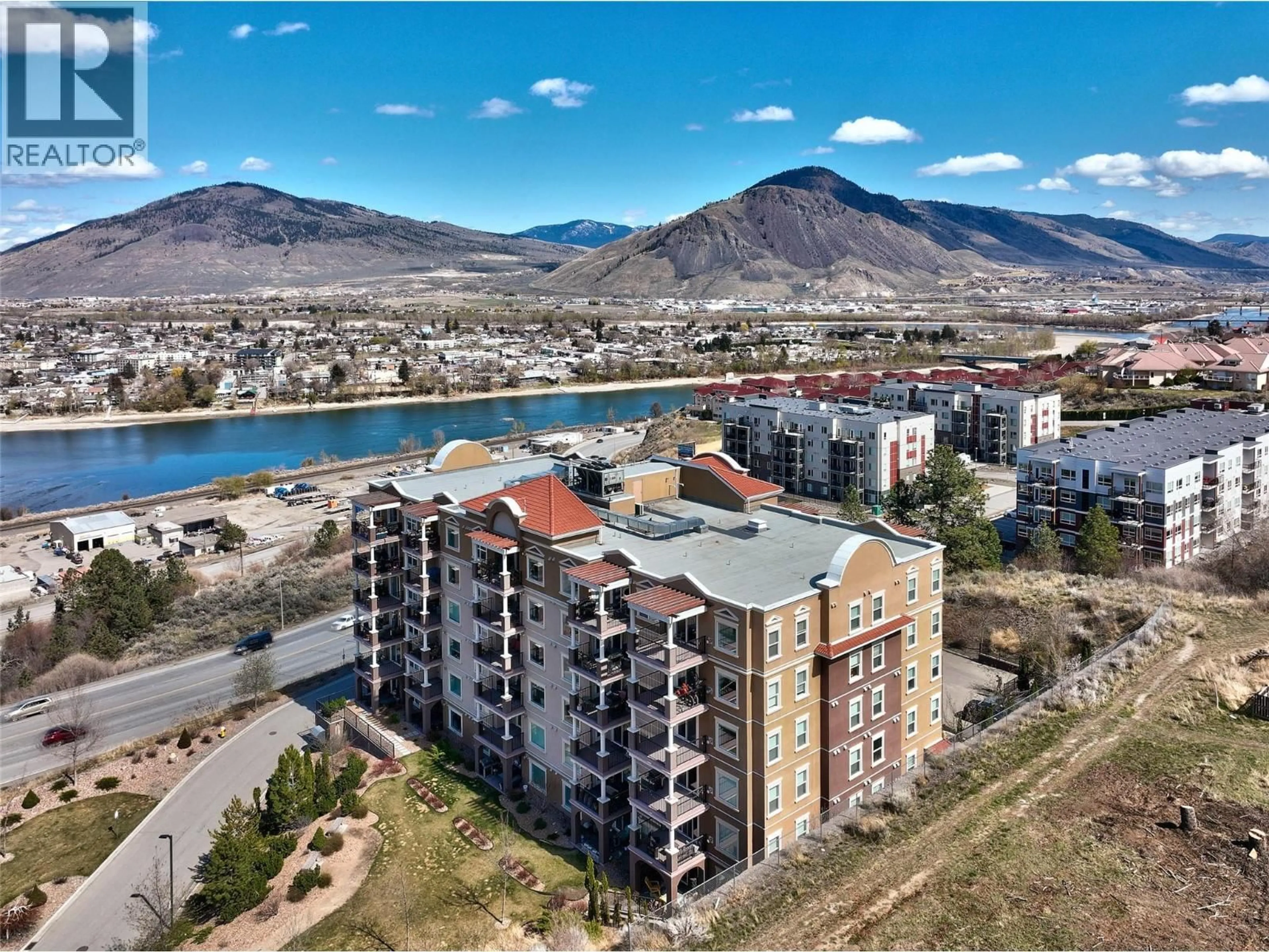 A pic from outside/outdoor area/front of a property/back of a property/a pic from drone, mountain view for 201 - 975 VICTORIA STREET WEST, Kamloops British Columbia V2C0C2