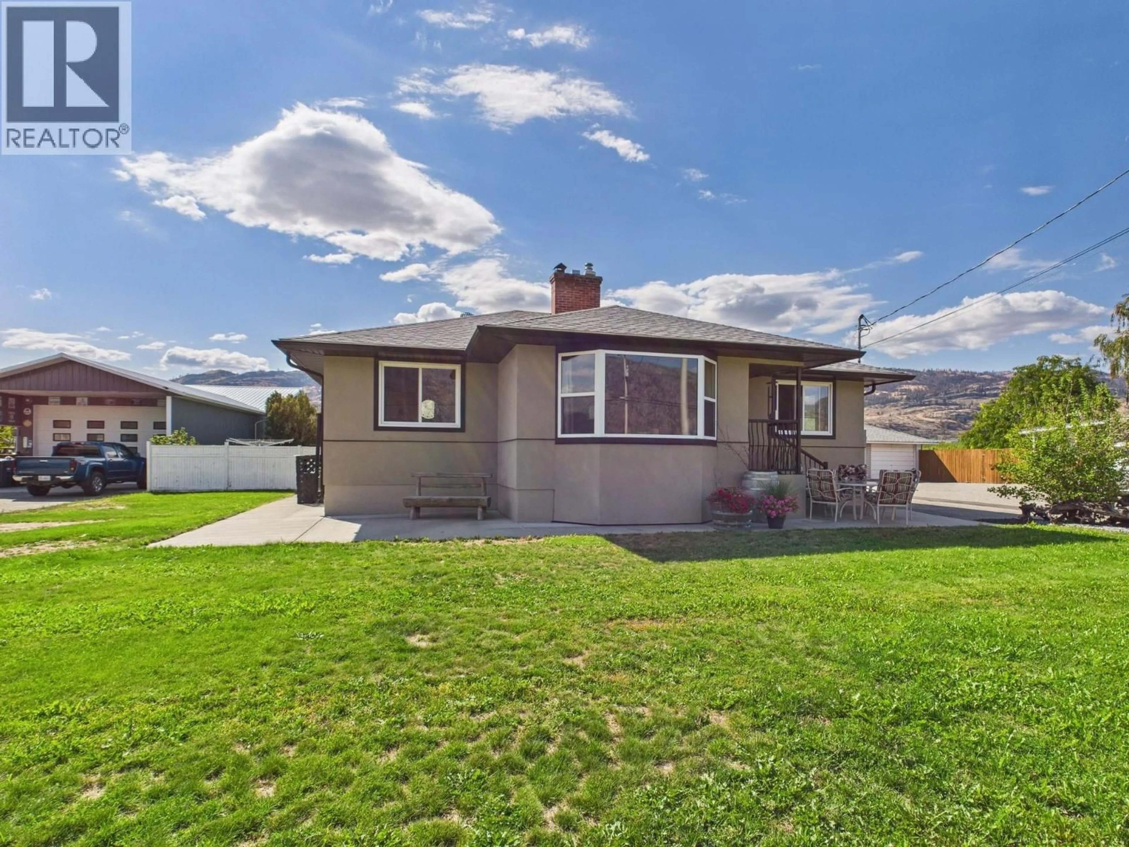 A pic from outside/outdoor area/front of a property/back of a property/a pic from drone, street for 9806 HIGHWAY 97 OTHER, Osoyoos British Columbia V0H1V2