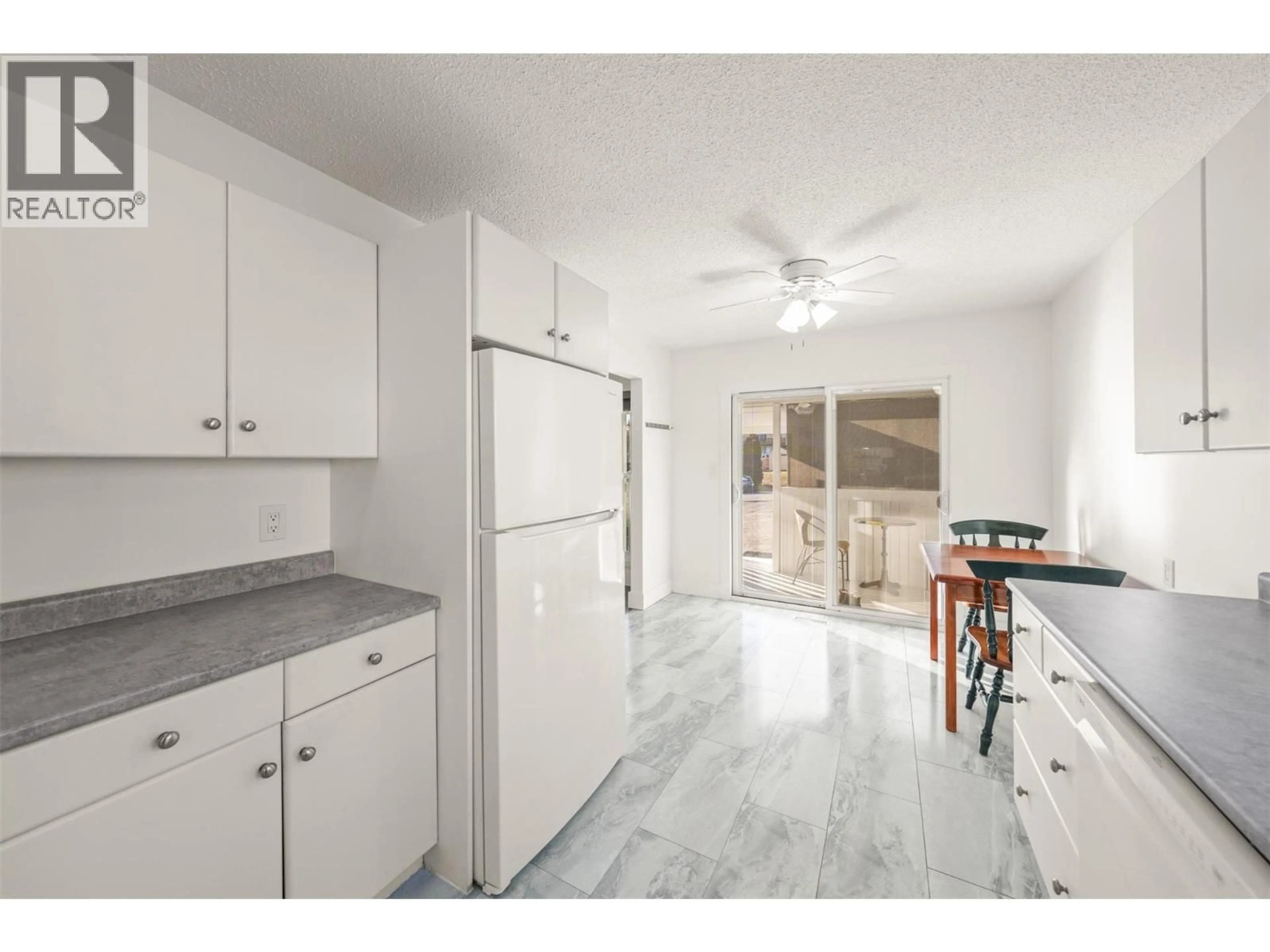 Standard kitchen, ceramic/tile floor for 3405 LOGAN ROAD, West Kelowna British Columbia V4T1N4