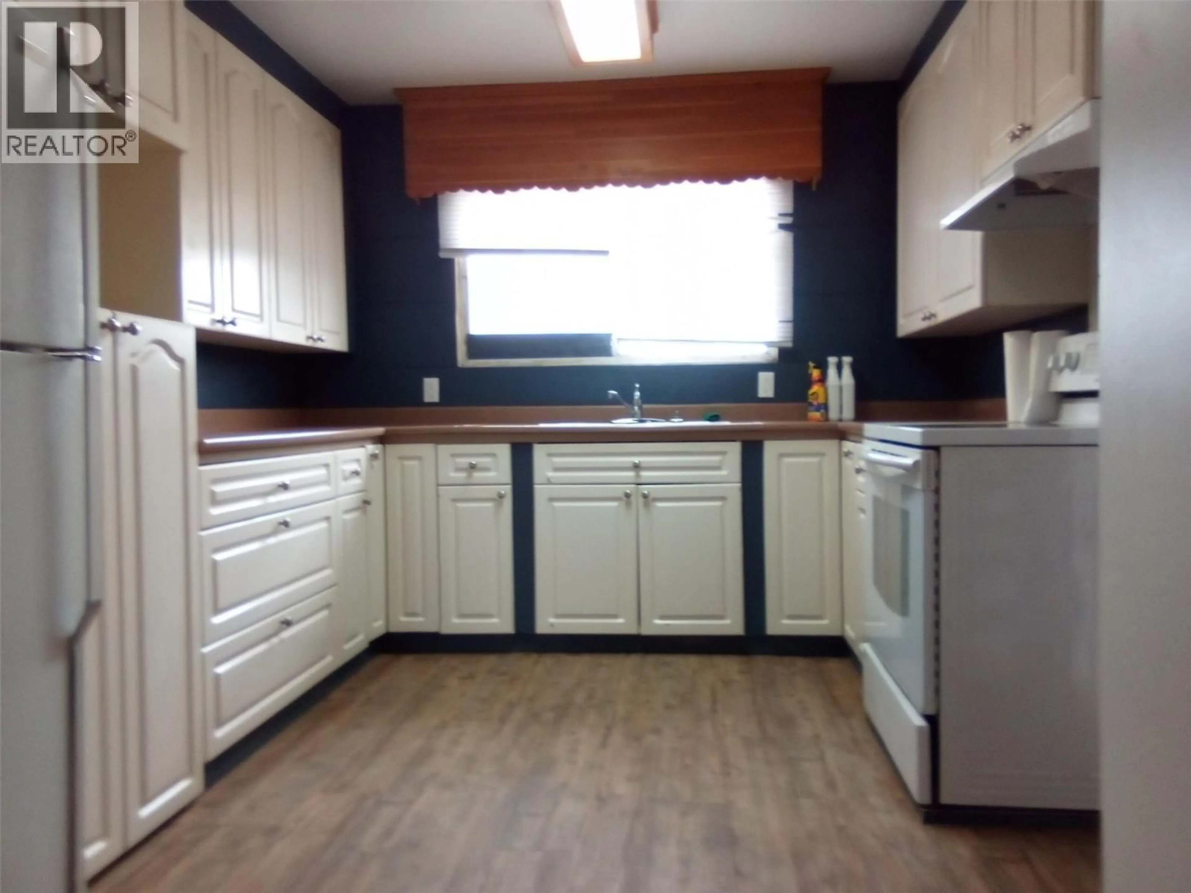 Standard kitchen, wood/laminate floor for 1672 DOUGLAS STREET, Merritt British Columbia V1K1E2