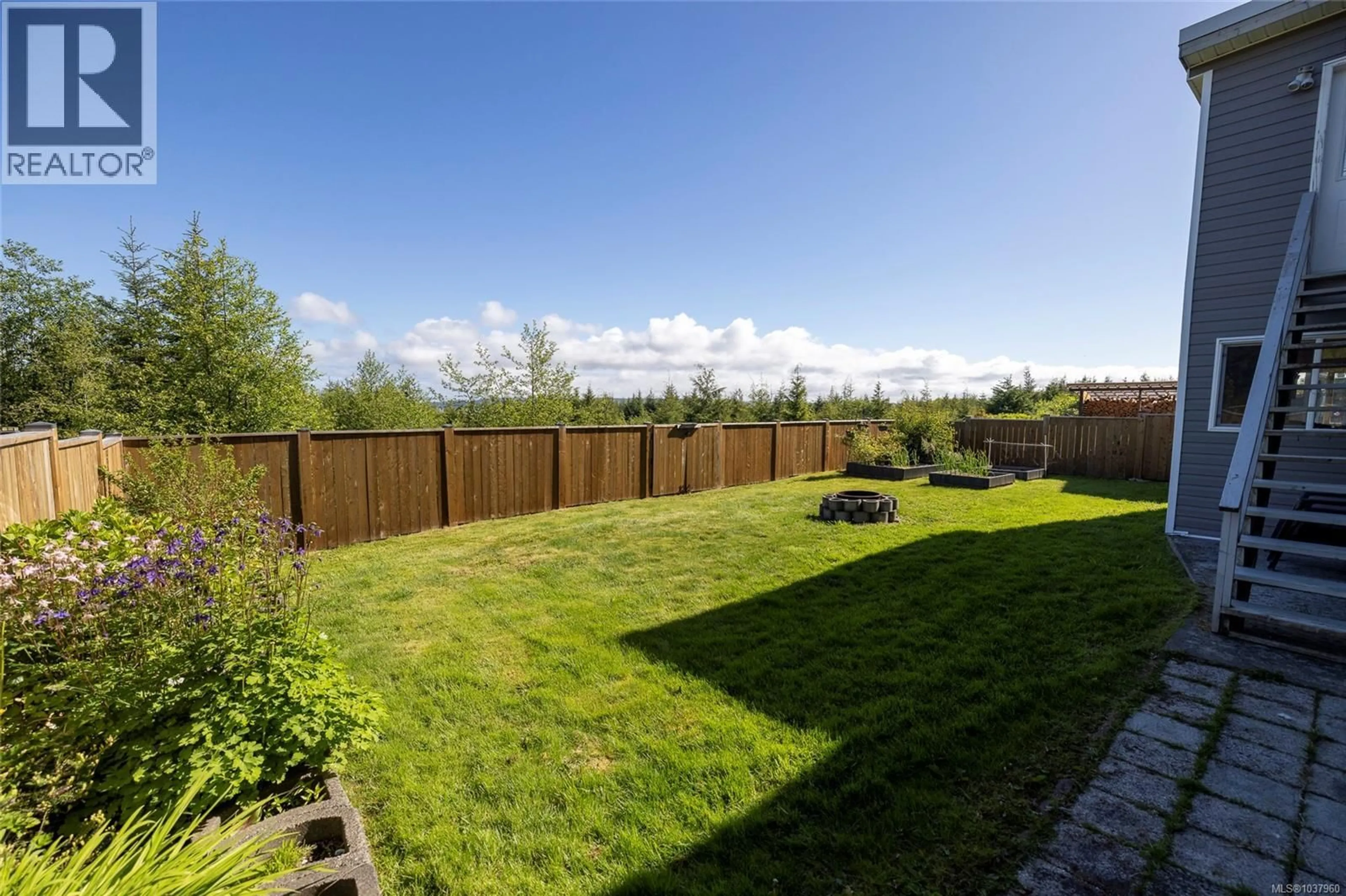 A pic from outside/outdoor area/front of a property/back of a property/a pic from drone, forest/trees view for 2874 WOODLAND DRIVE, Port McNeill British Columbia V0N2R0