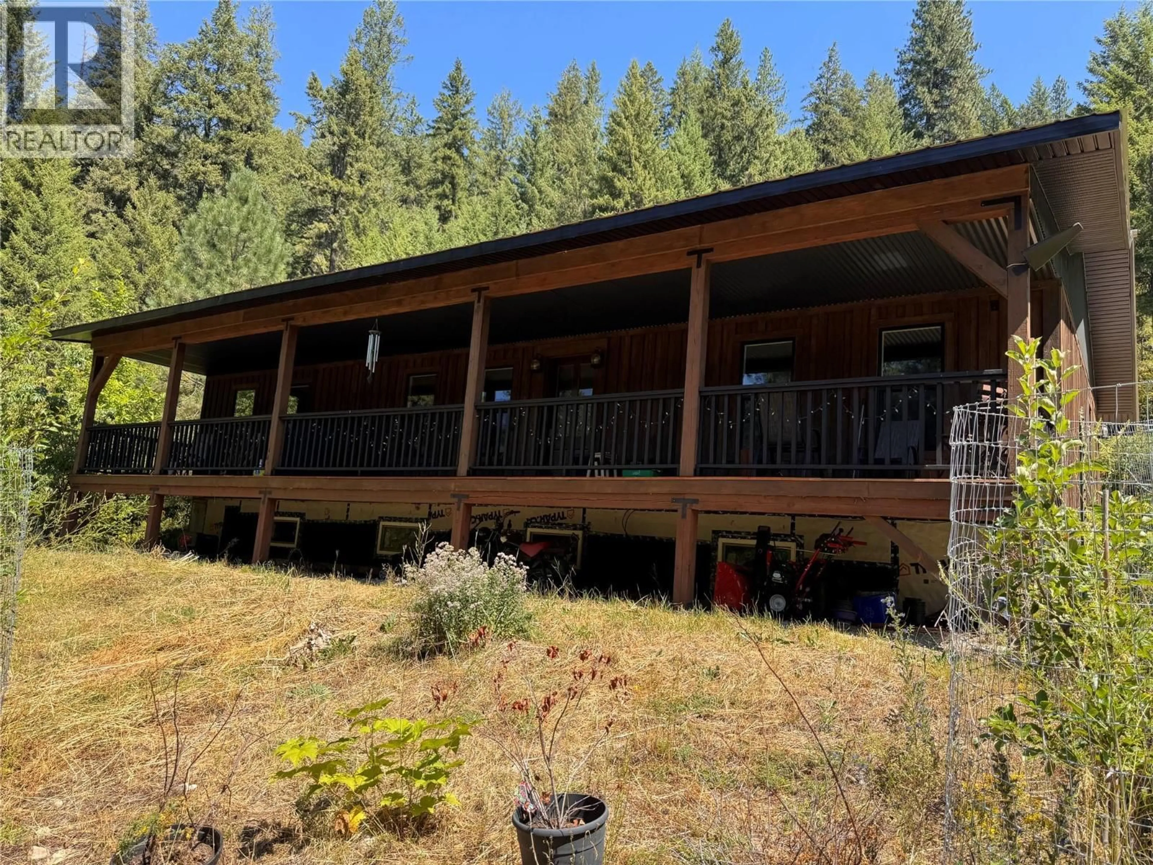 A pic from outside/outdoor area/front of a property/back of a property/a pic from drone, unknown for 2160 3 HIGHWAY, Christina Lake British Columbia V0H1E3