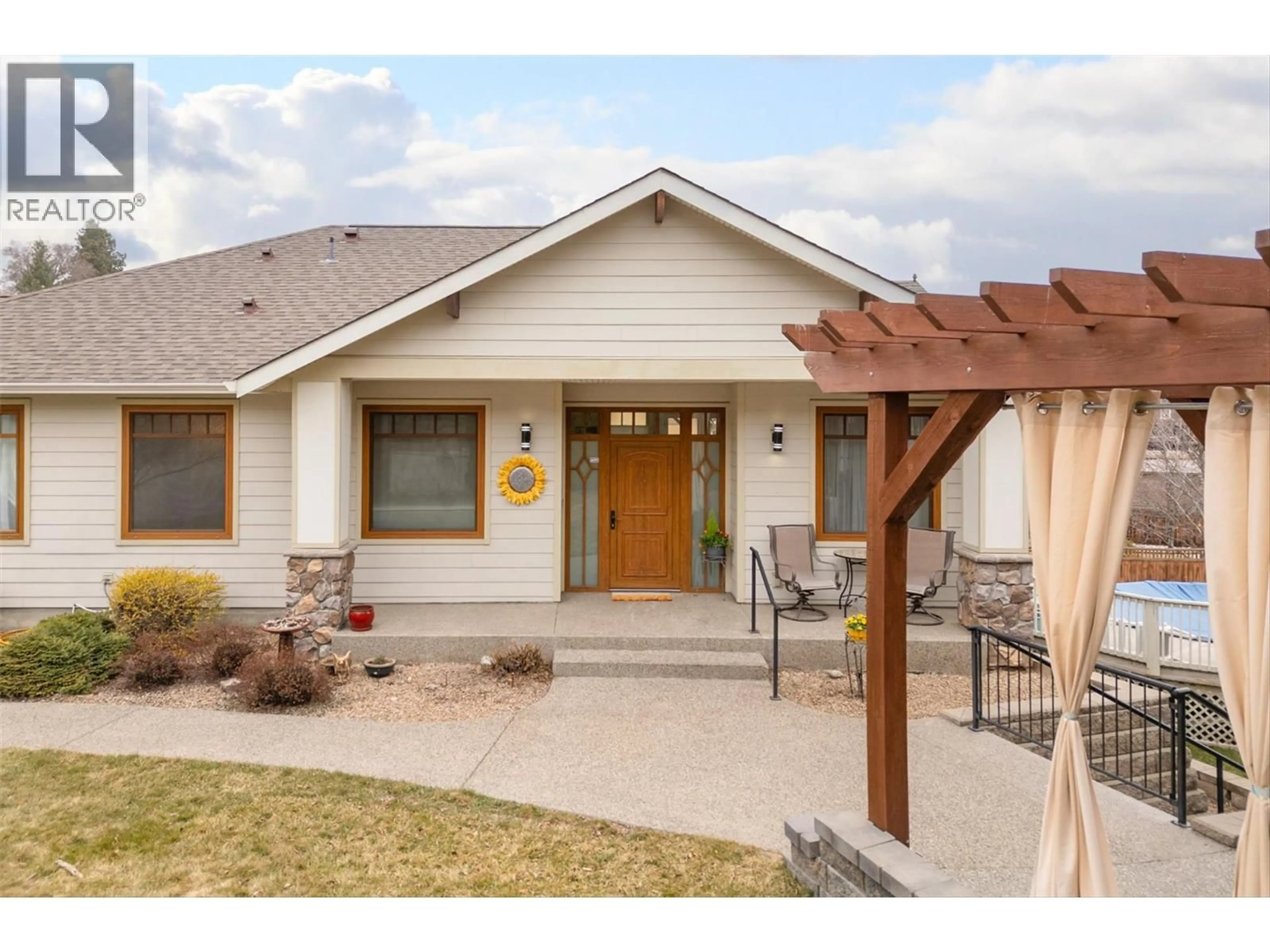 Home with vinyl exterior material, street for 174 JEWELL PLACE, Summerland British Columbia V0H1Z4