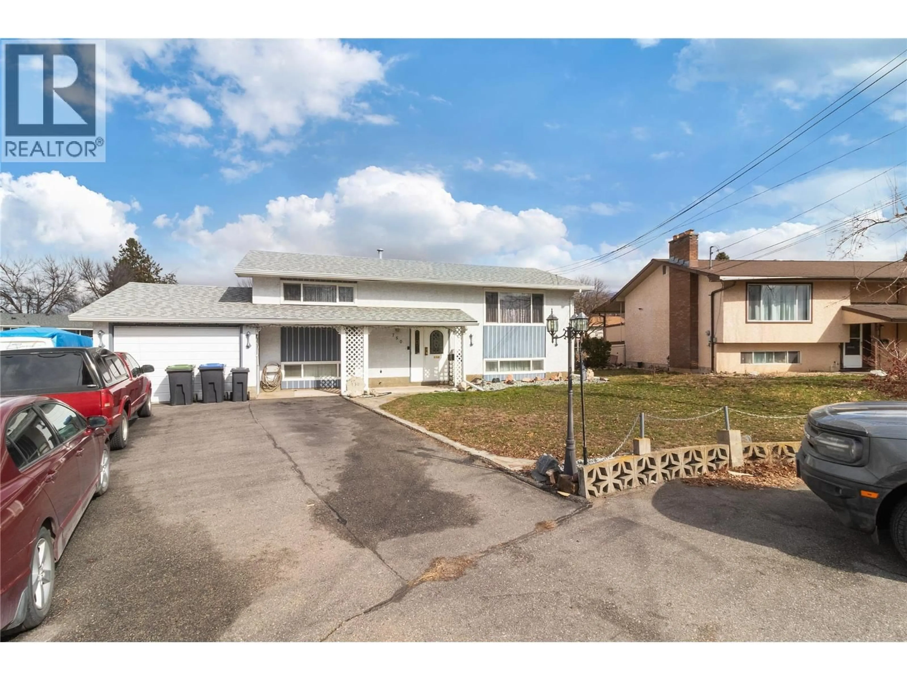 A pic from outside/outdoor area/front of a property/back of a property/a pic from drone, street for 750 FALKIRK ROAD, Kelowna British Columbia V1X1R1