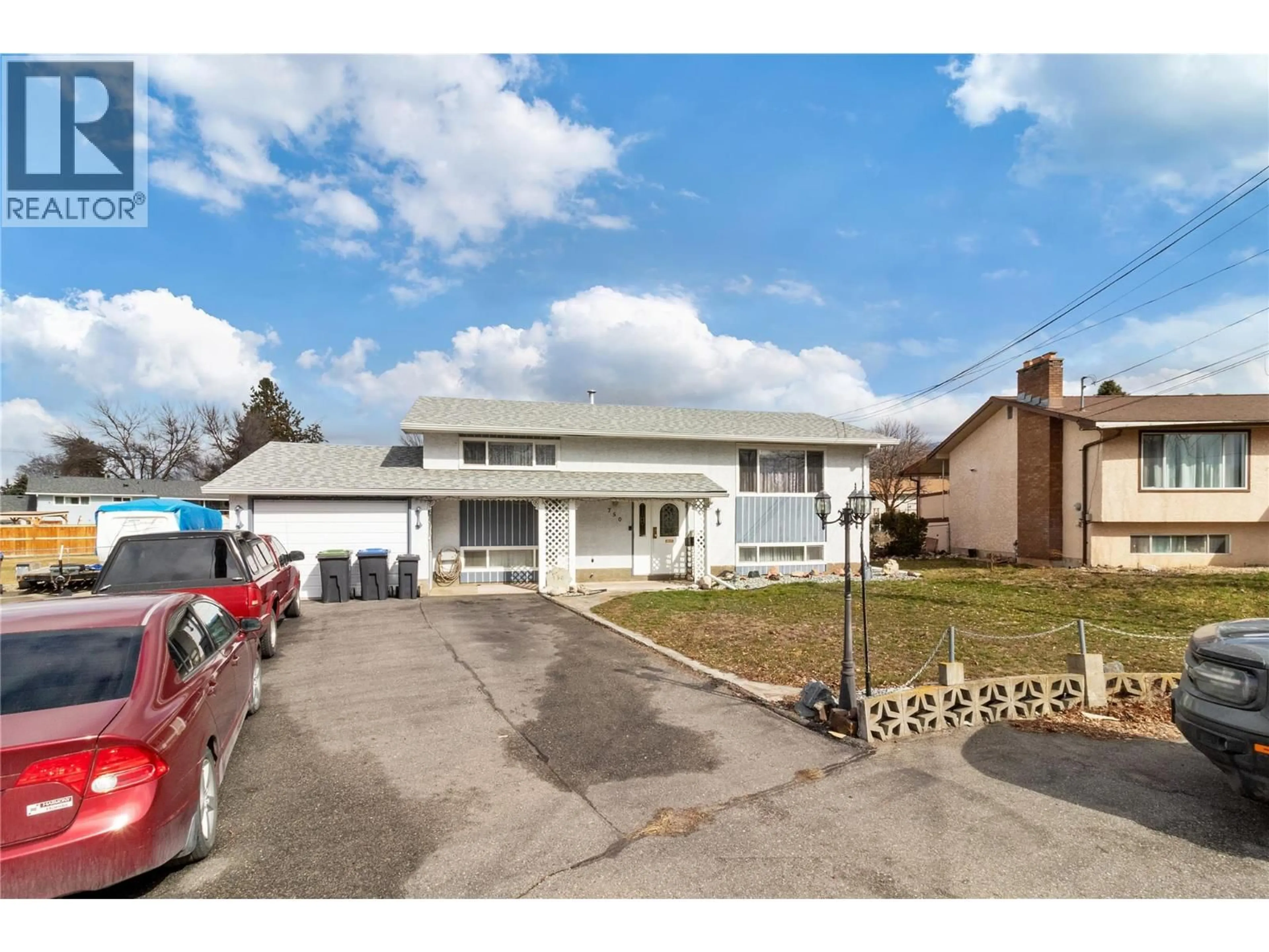 A pic from outside/outdoor area/front of a property/back of a property/a pic from drone, street for 750 FALKIRK ROAD, Kelowna British Columbia V1X1R1
