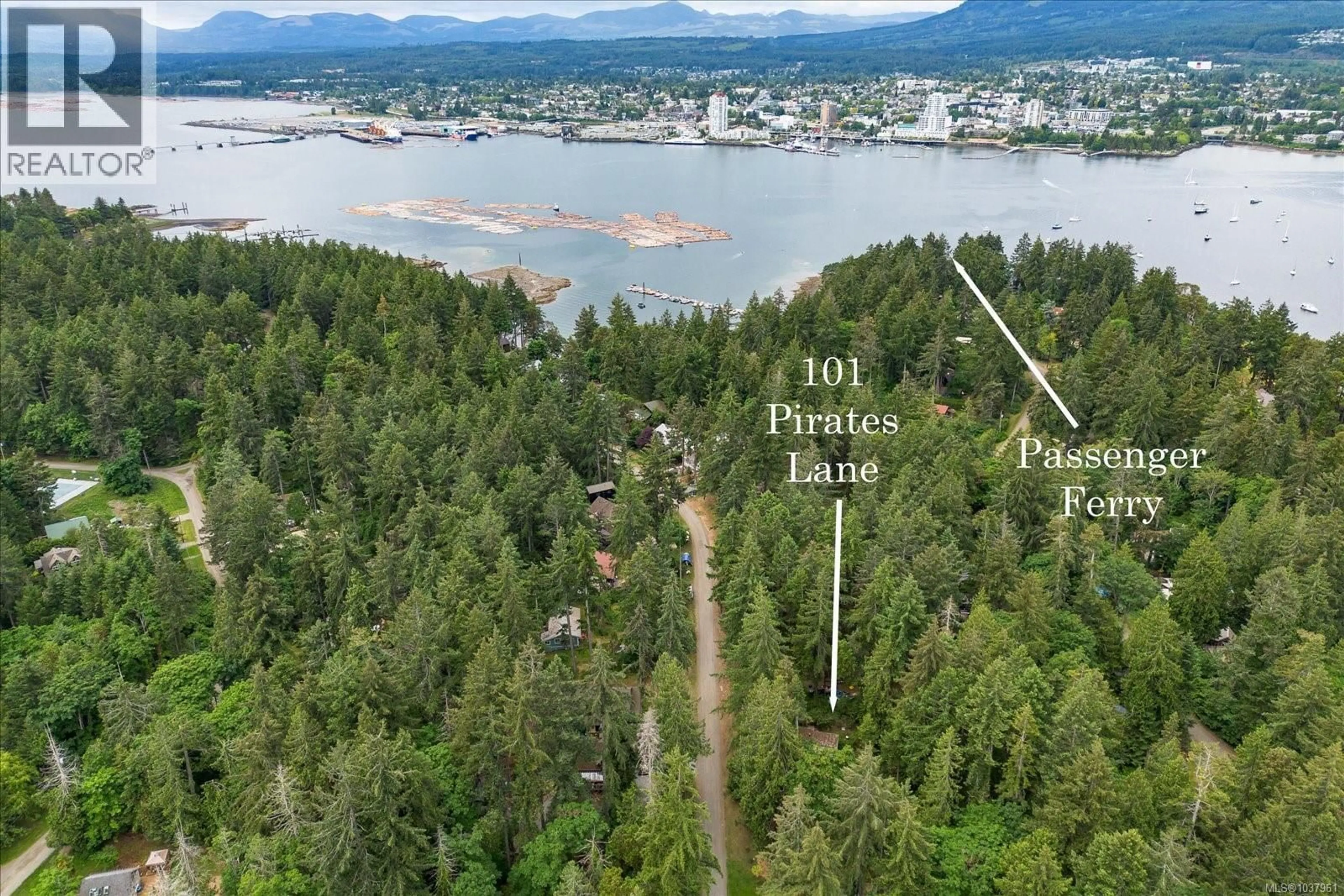 A pic from outside/outdoor area/front of a property/back of a property/a pic from drone, water/lake/river/ocean view for 101 PIRATES LANE, Protection Island British Columbia V9R6R1