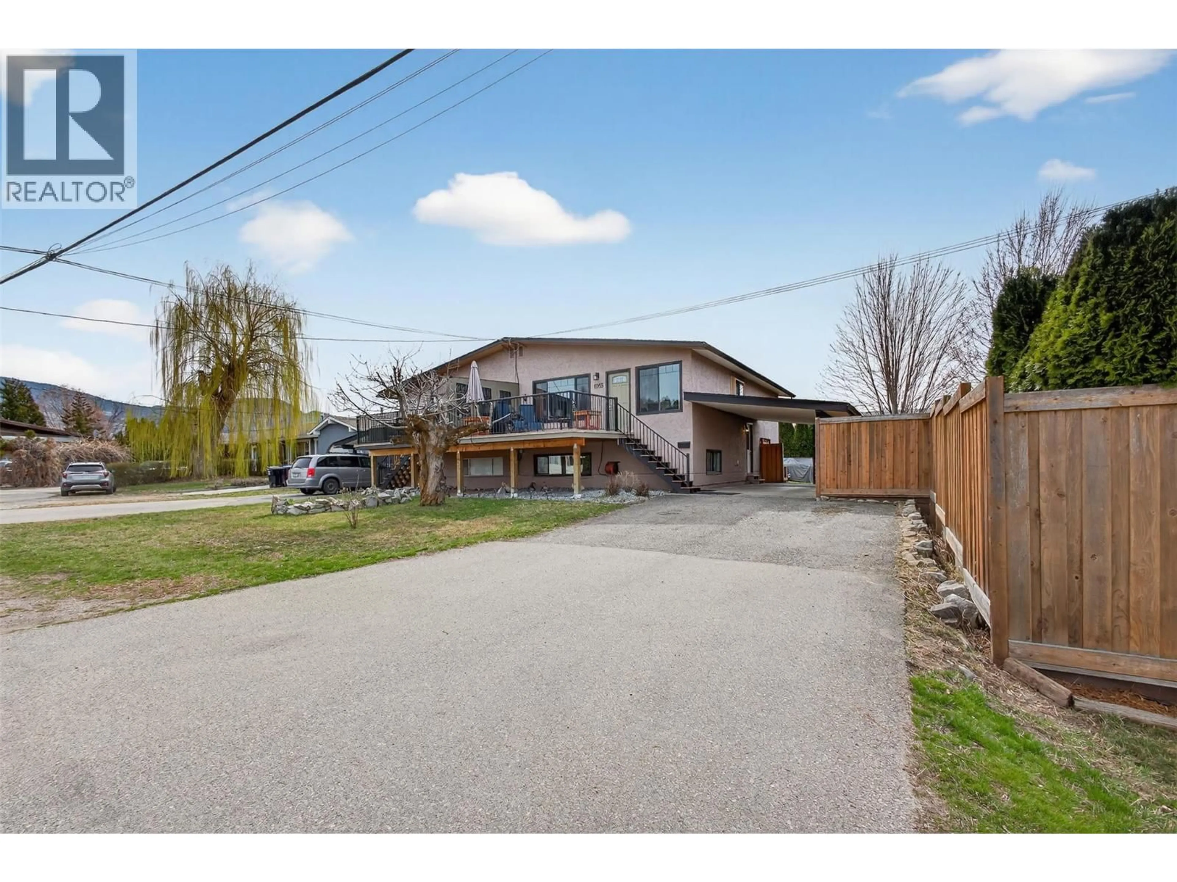 A pic from outside/outdoor area/front of a property/back of a property/a pic from drone, street for 1085 ALTA DENA ROAD, Kelowna British Columbia V1X4K1
