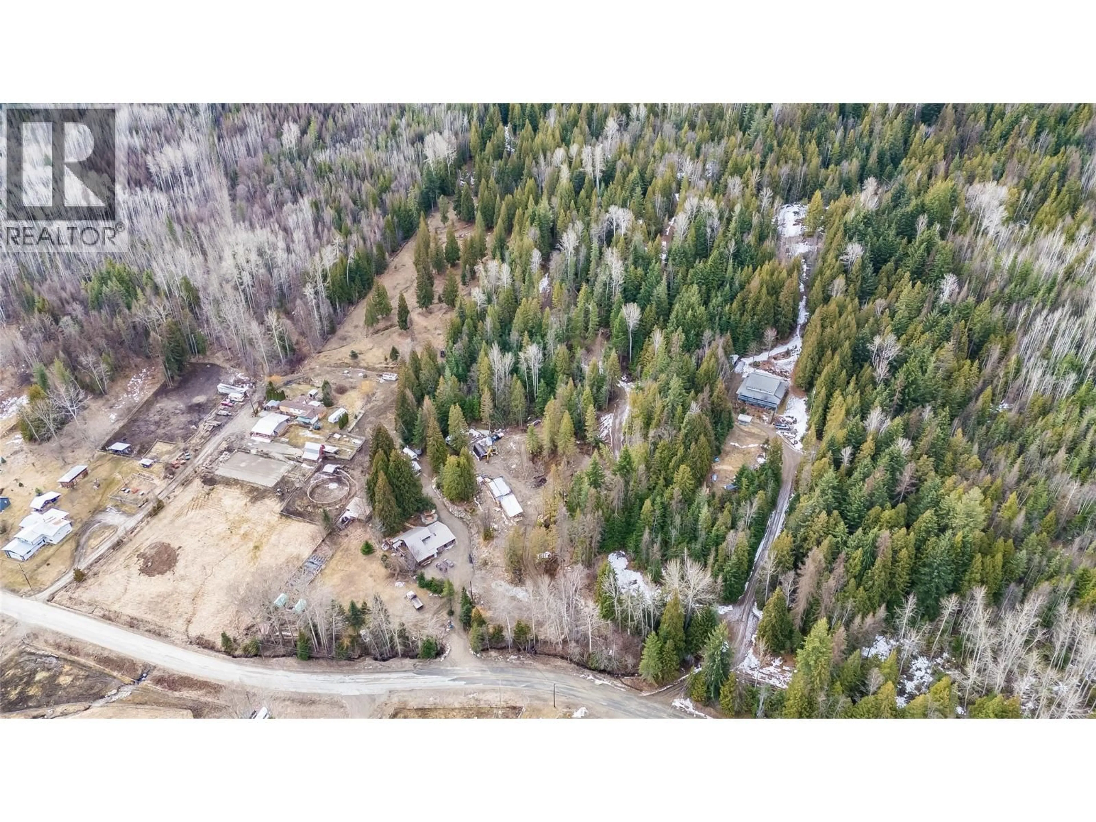 A pic from outside/outdoor area/front of a property/back of a property/a pic from drone, forest/trees view for 4229 CASINO ROAD, Trail British Columbia V1R4X3