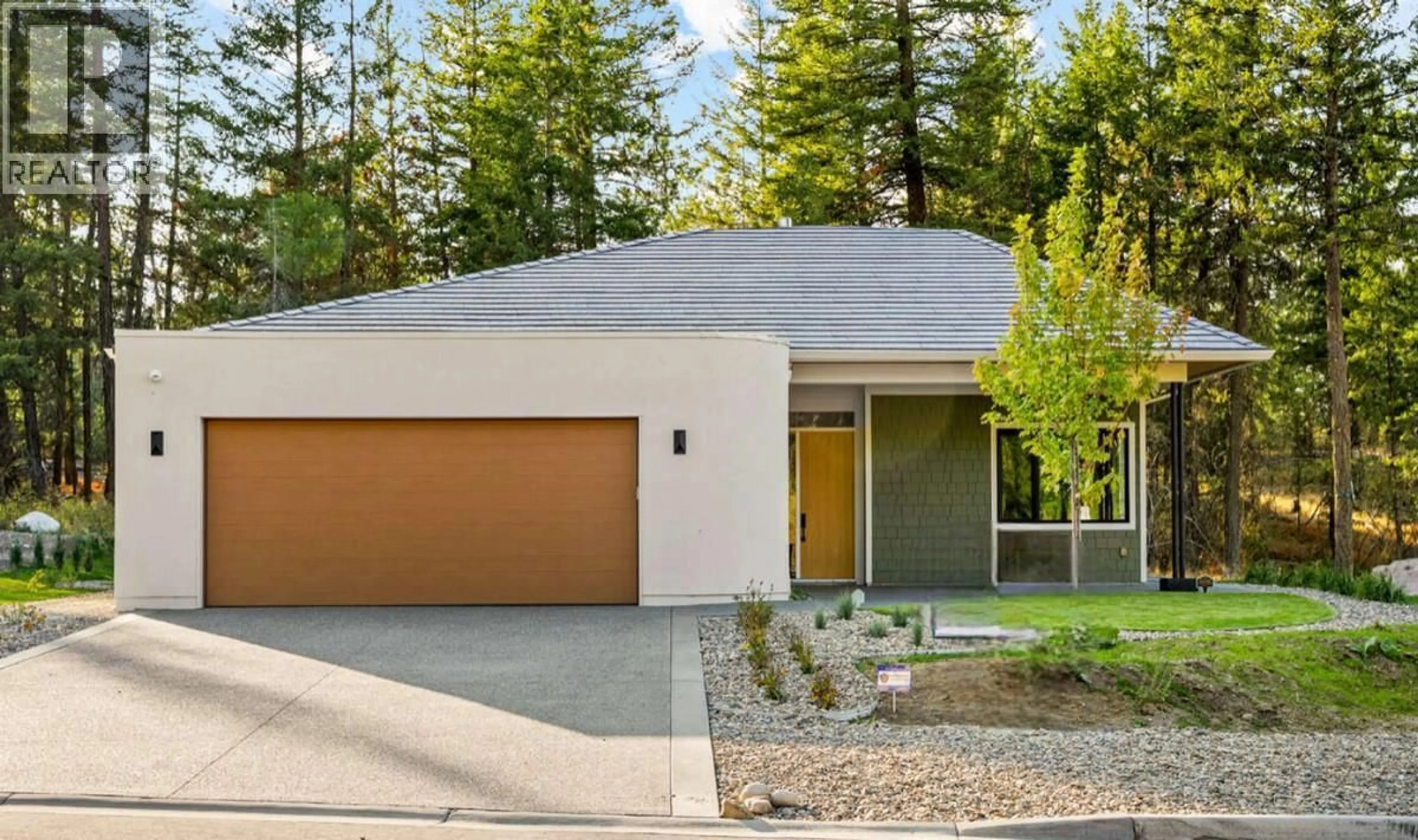 Home with vinyl exterior material, street for 1 - 799 PREDATOR RIDGE DRIVE, Vernon British Columbia V1H1G4