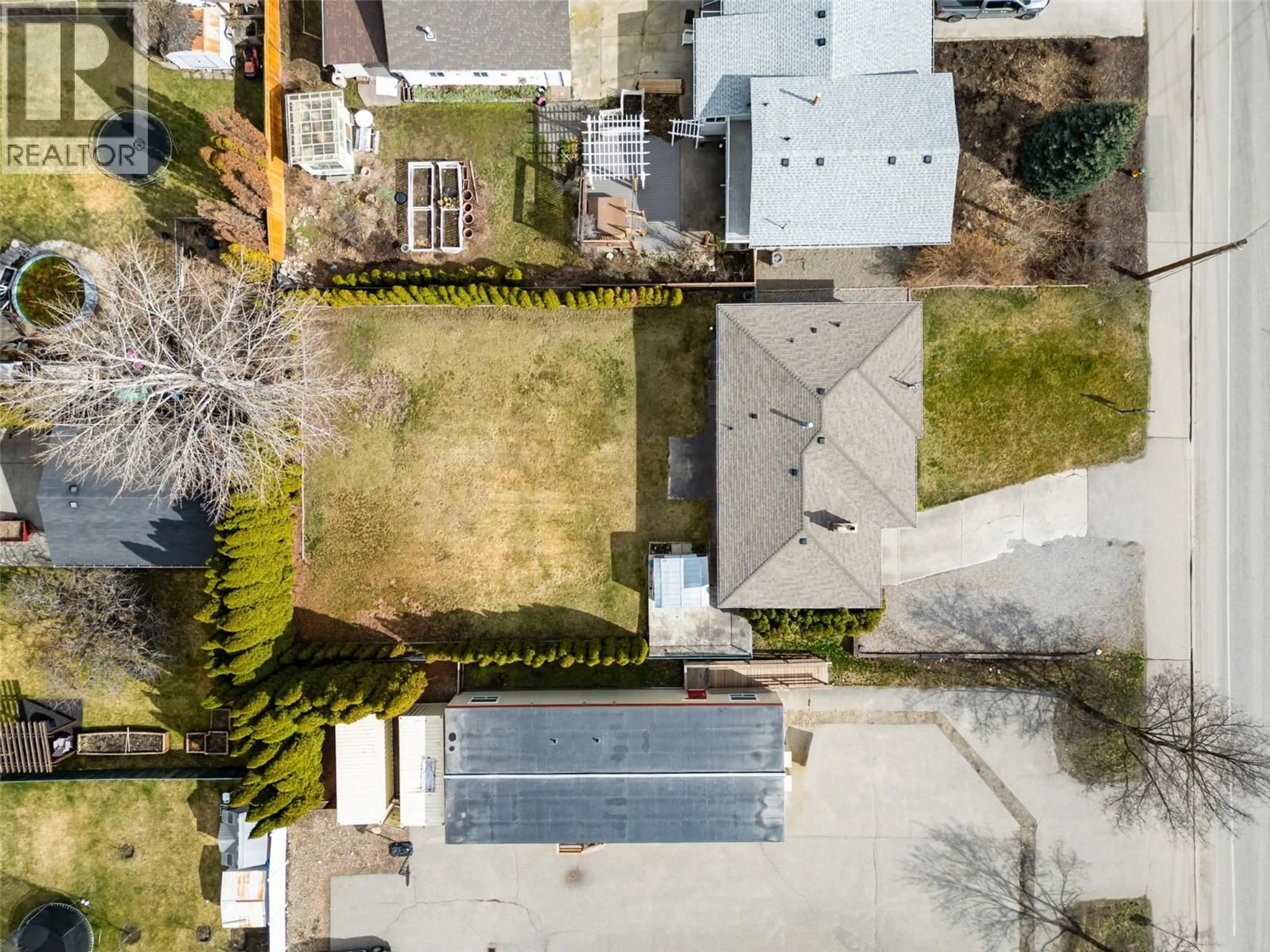 A pic from outside/outdoor area/front of a property/back of a property/a pic from drone, street for 350 LEATHEAD ROAD, Kelowna British Columbia V1X2H8