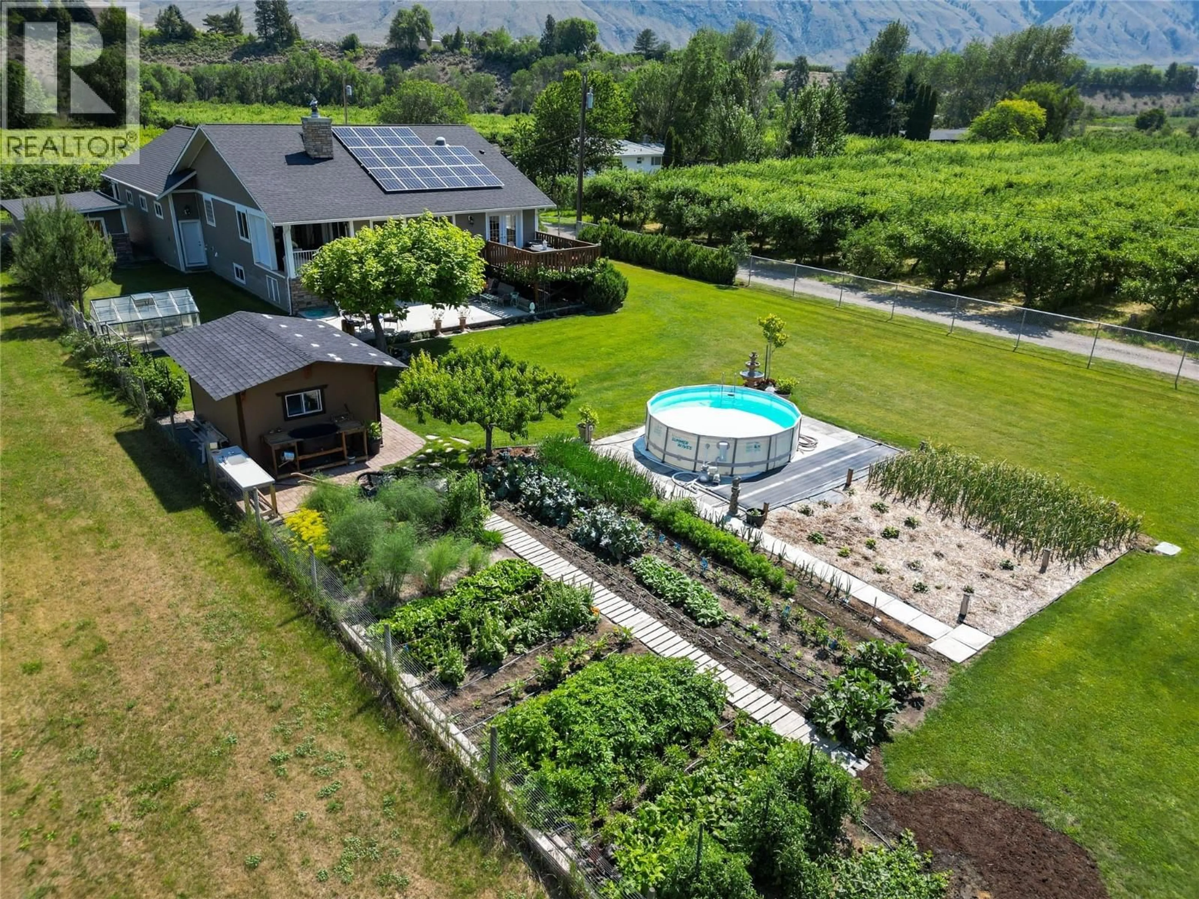 A pic from outside/outdoor area/front of a property/back of a property/a pic from drone, mountain view for 2120 RITCHIE DRIVE, Cawston British Columbia V0X1C2