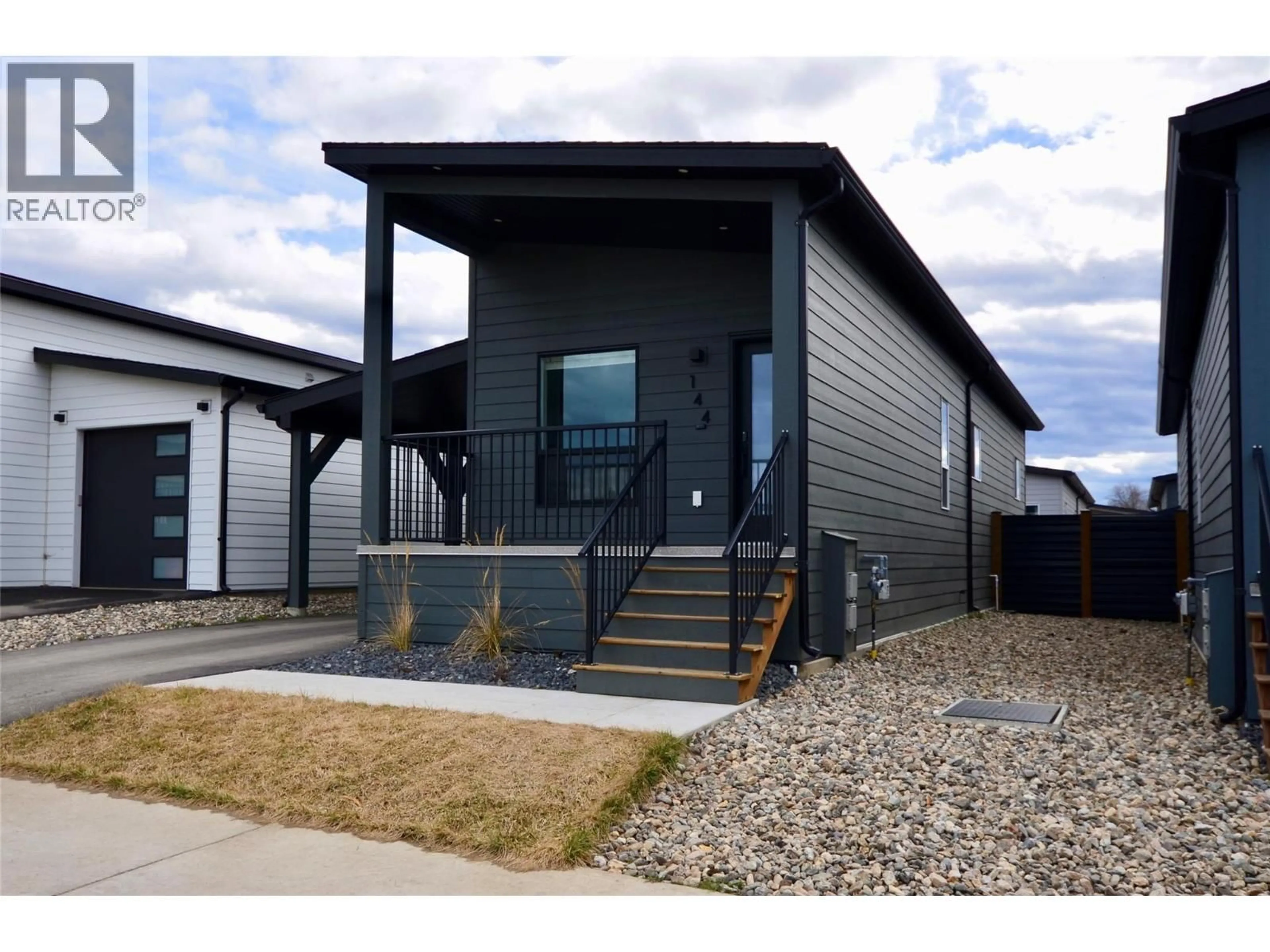 Home with vinyl exterior material, street for 144 - 8900 JIM BAILEY ROAD, Kelowna British Columbia V4V0B5