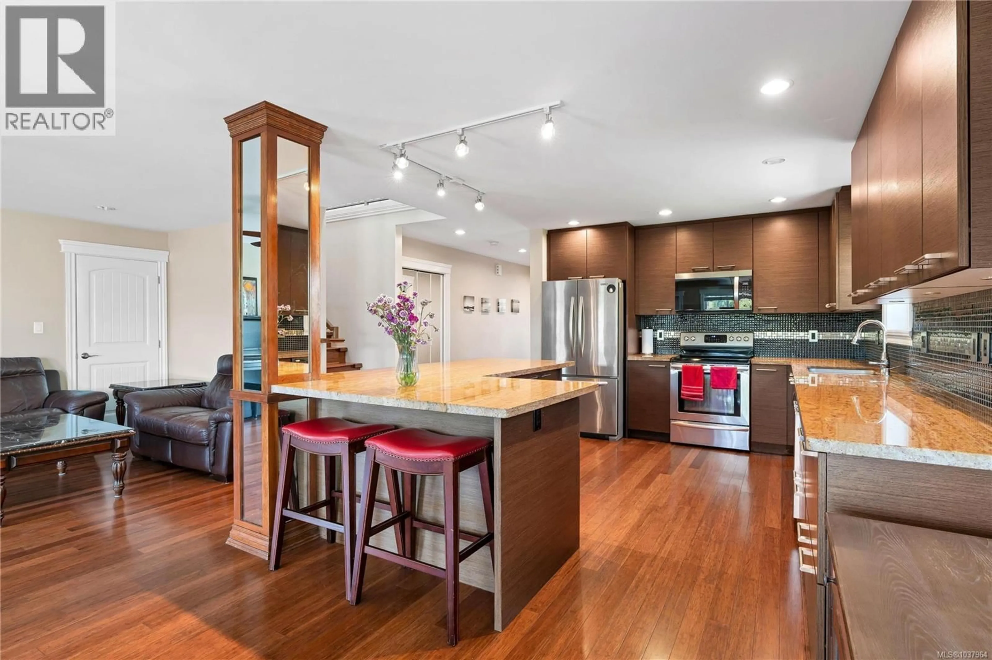 Open concept kitchen, wood/laminate floor for 721 NIRWAN PLACE, Langford British Columbia V9B6H4