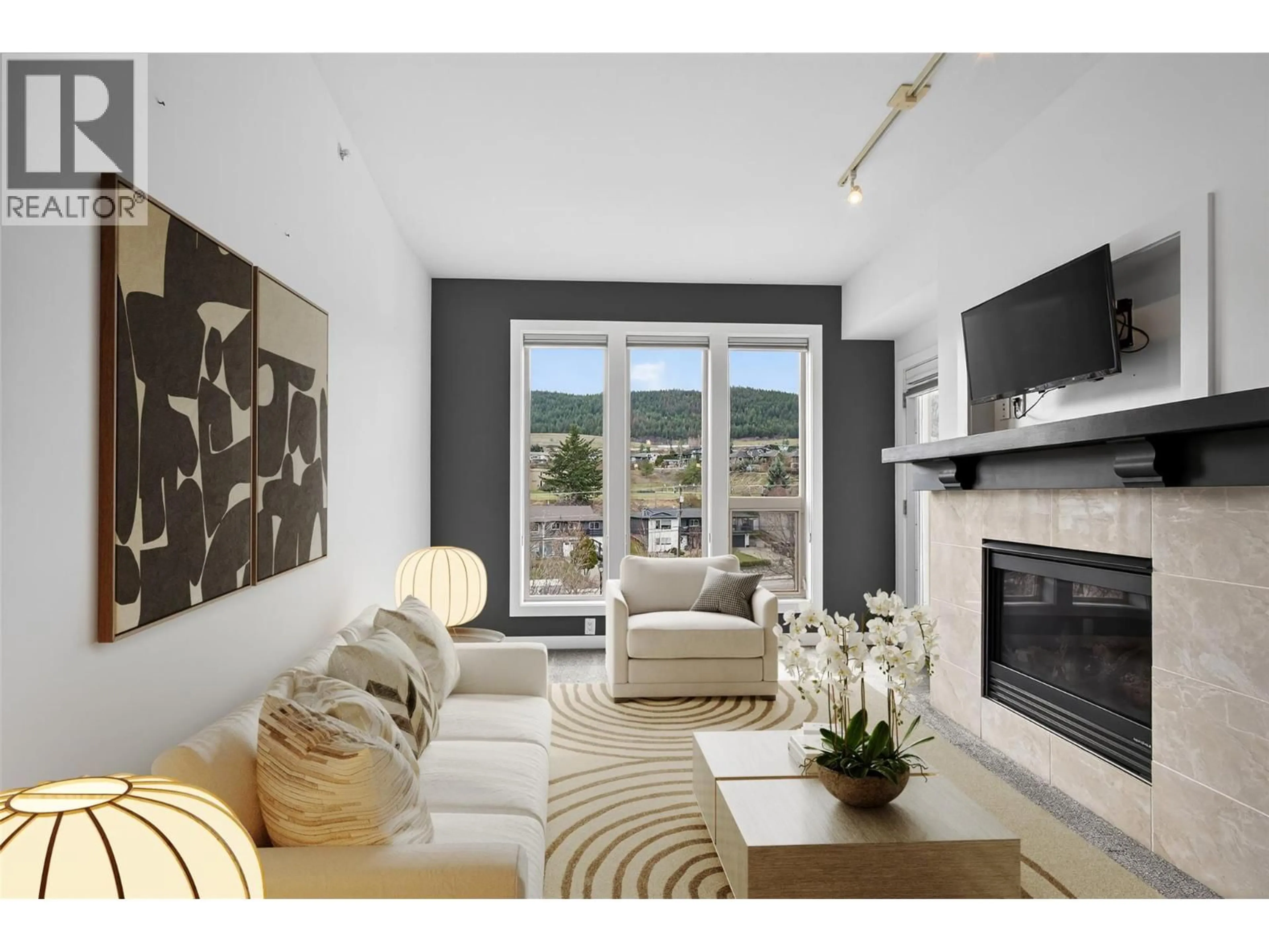 Living room with furniture, unknown for 2402 - 7343 OKANAGAN LANDING ROAD, Vernon British Columbia V1H2J6