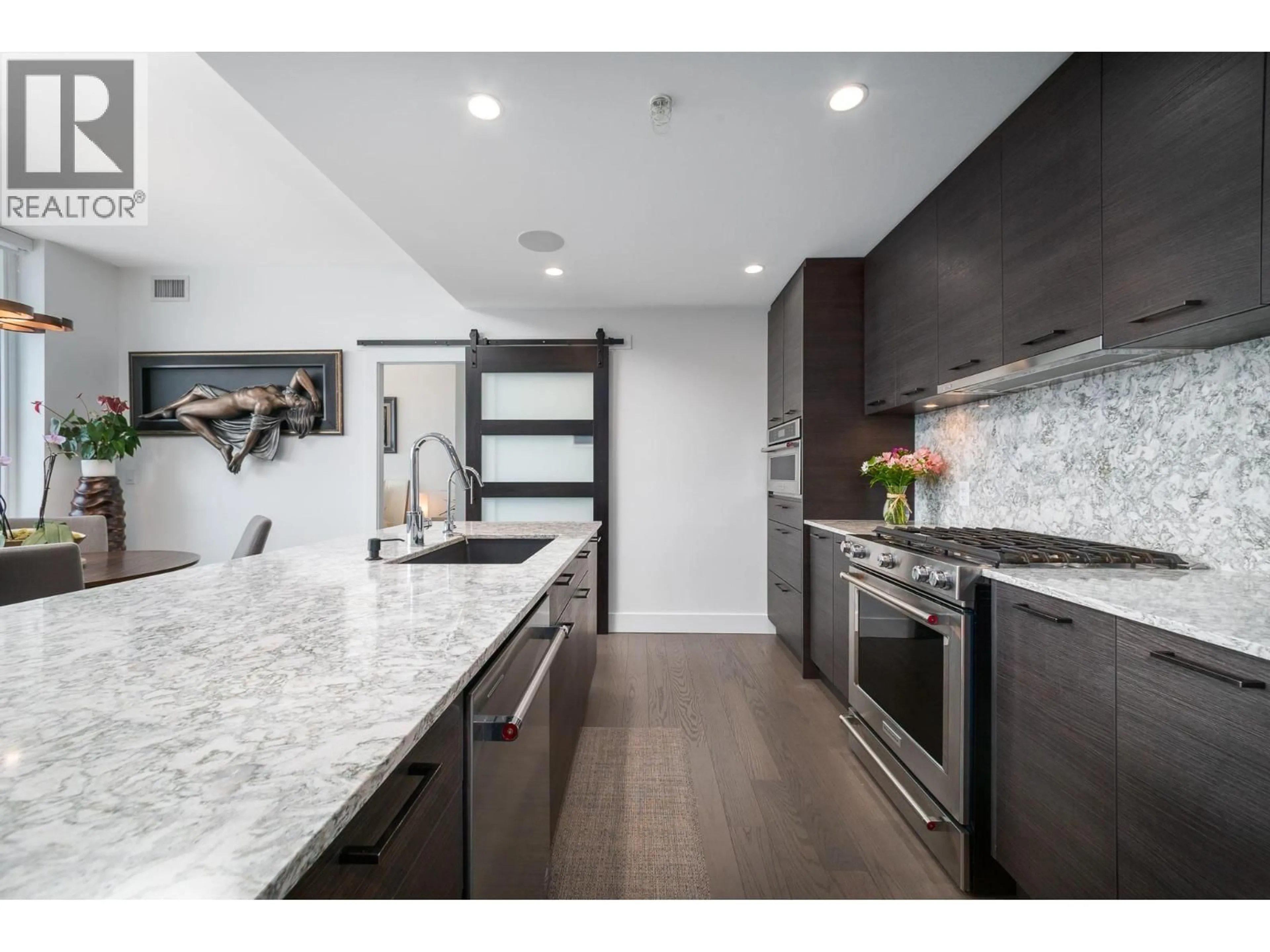 Contemporary kitchen, ceramic/tile floor for 2104 - 1191 SUNSET DRIVE, Kelowna British Columbia V1Y0J4
