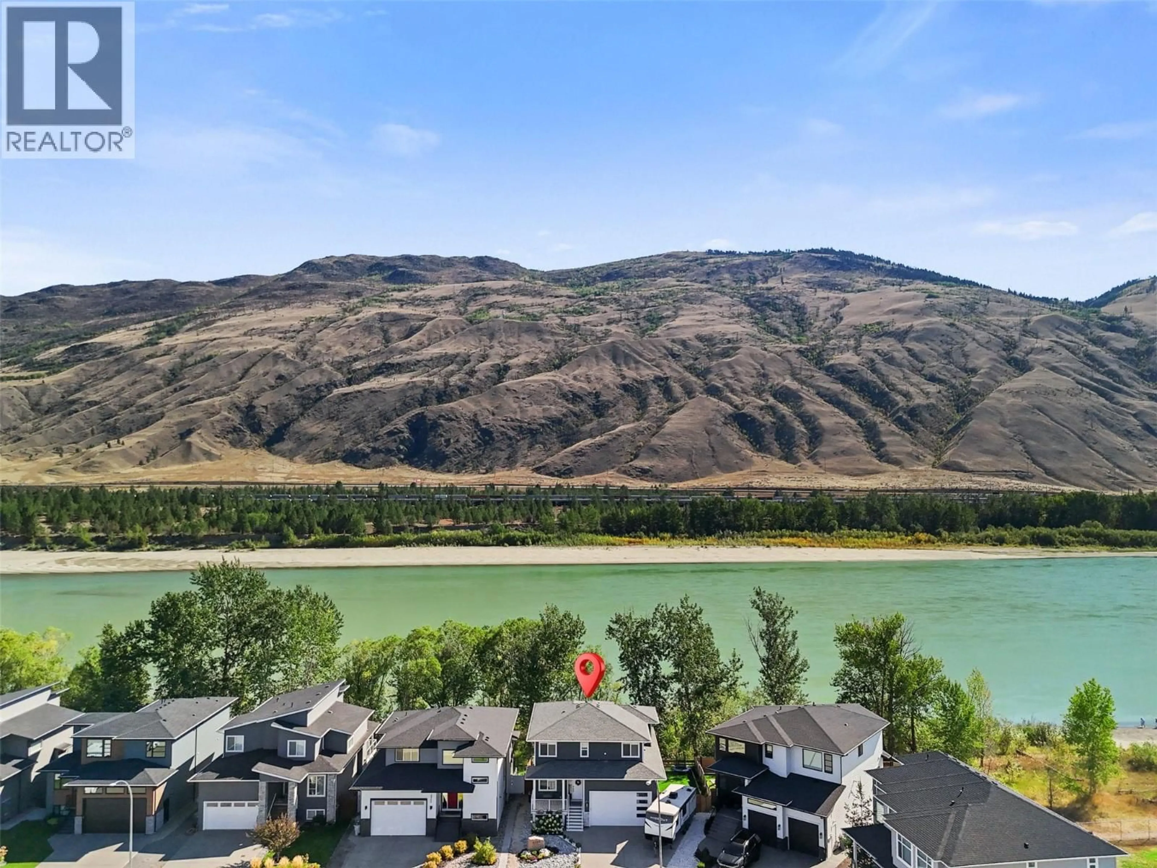 A pic from outside/outdoor area/front of a property/back of a property/a pic from drone, water/lake/river/ocean view for 2742 BEACHMOUNT CRESCENT, Kamloops British Columbia V2B0E6