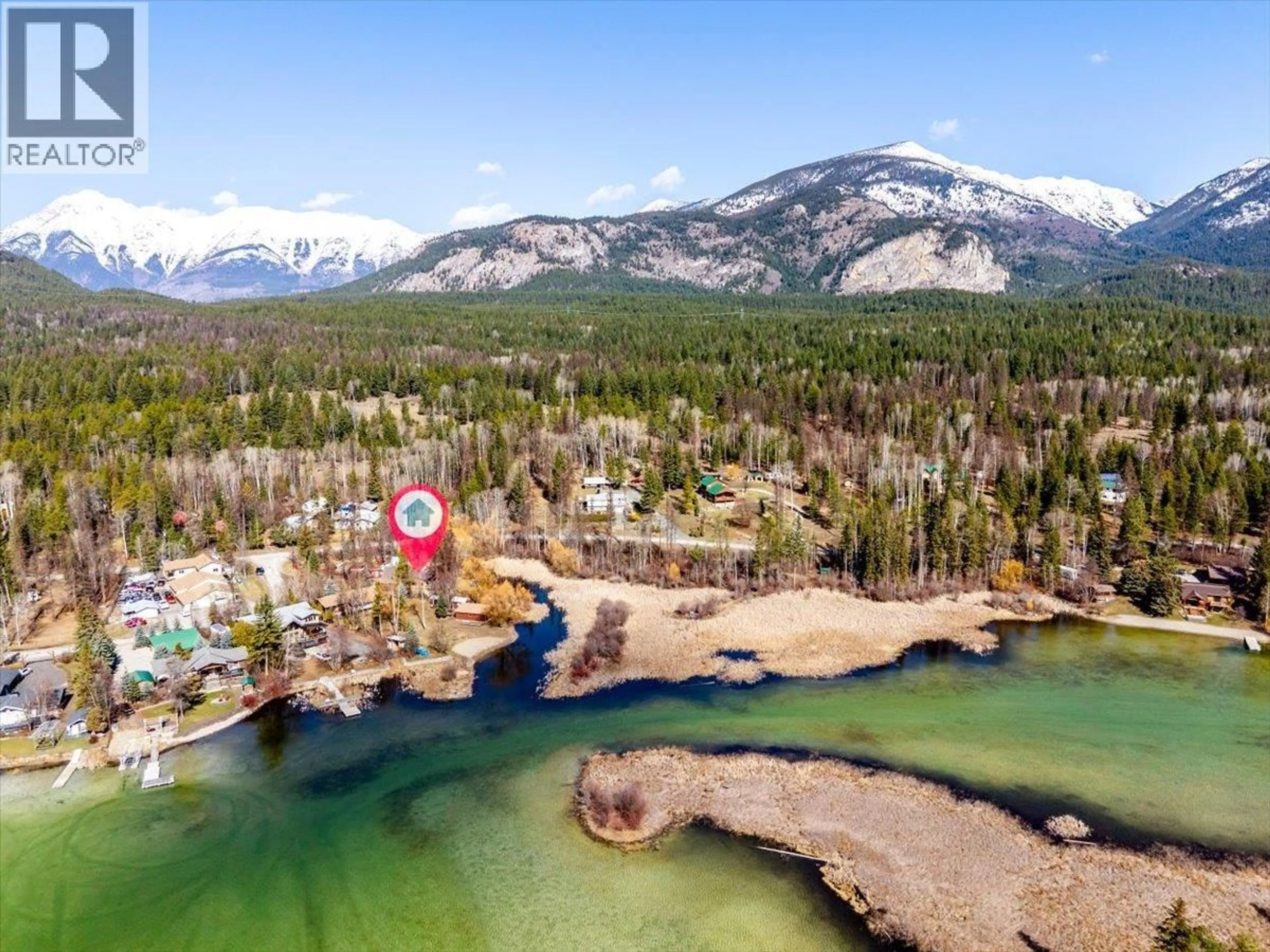 A pic from outside/outdoor area/front of a property/back of a property/a pic from drone, water/lake/river/ocean view for 1536 TIE LAKE LOOP RD. N ROAD, Jaffray British Columbia V0B1T0