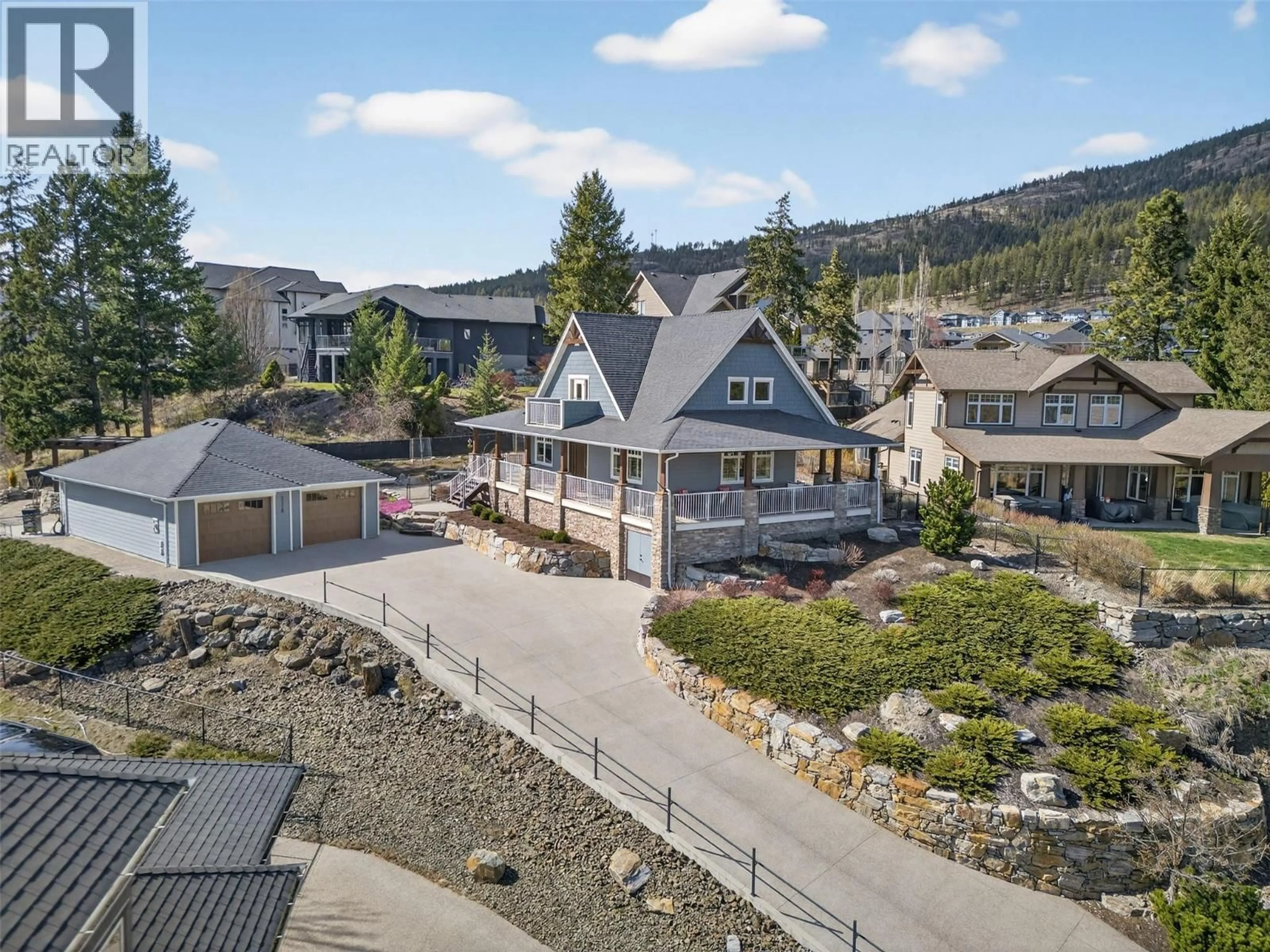 A pic from outside/outdoor area/front of a property/back of a property/a pic from drone, mountain view for 2478 STONE GROVE CRESCENT, West Kelowna British Columbia V4T3A8